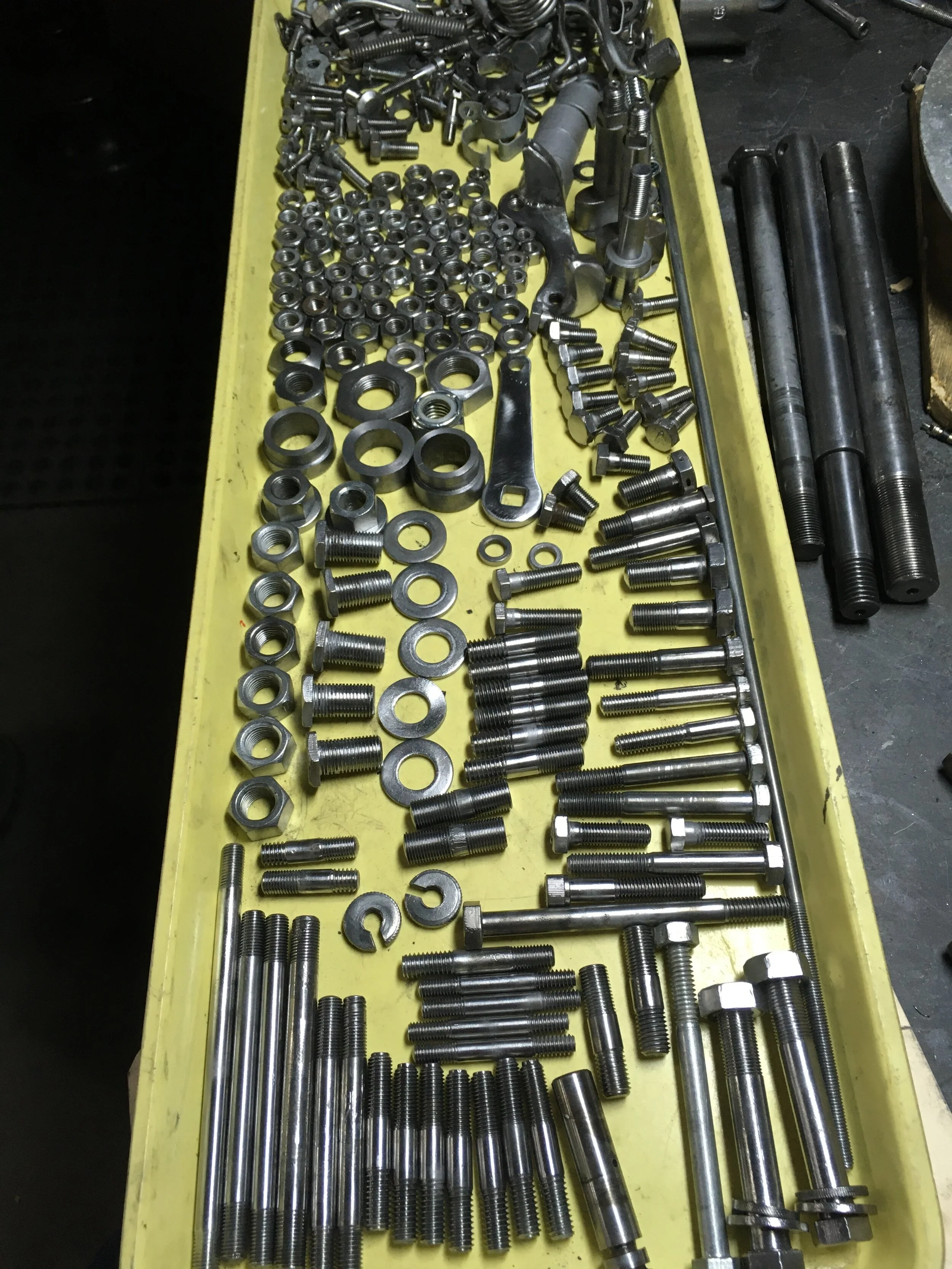  Some really rough hardware after all the cleaning and burnishing. There is a lot that goes into hardware restoration on these builds. As much as possible, correct original parts are used over new or reproduction parts, but in the case of this bike, 