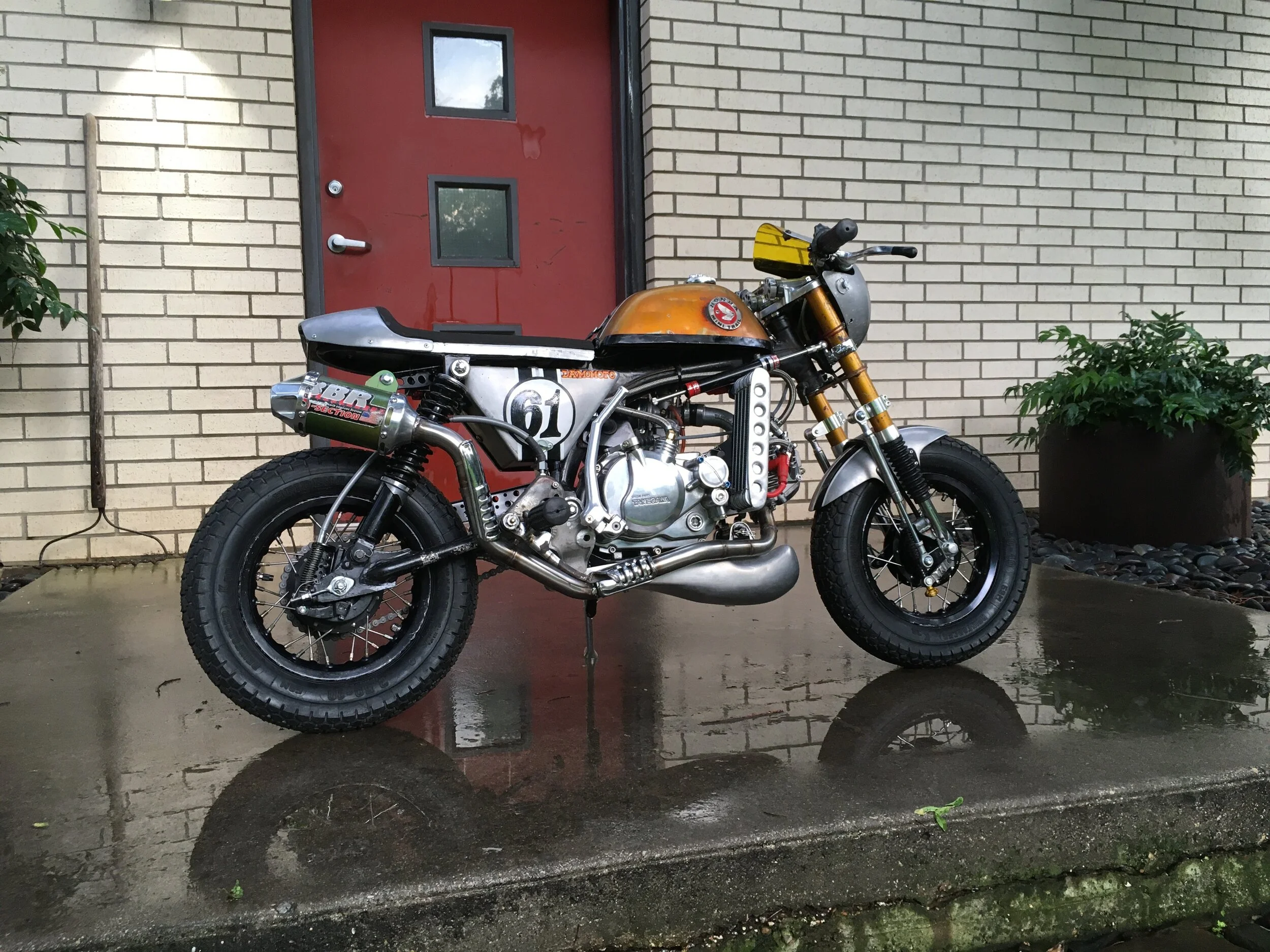  A friend gave me a junked-out 1972 Honda Z50 frame and engine for helping him build up his 1978 Z50. The tank was full of holes on the bottom, but there was something about the faded gold that caught my interest. As with a number of builds around he
