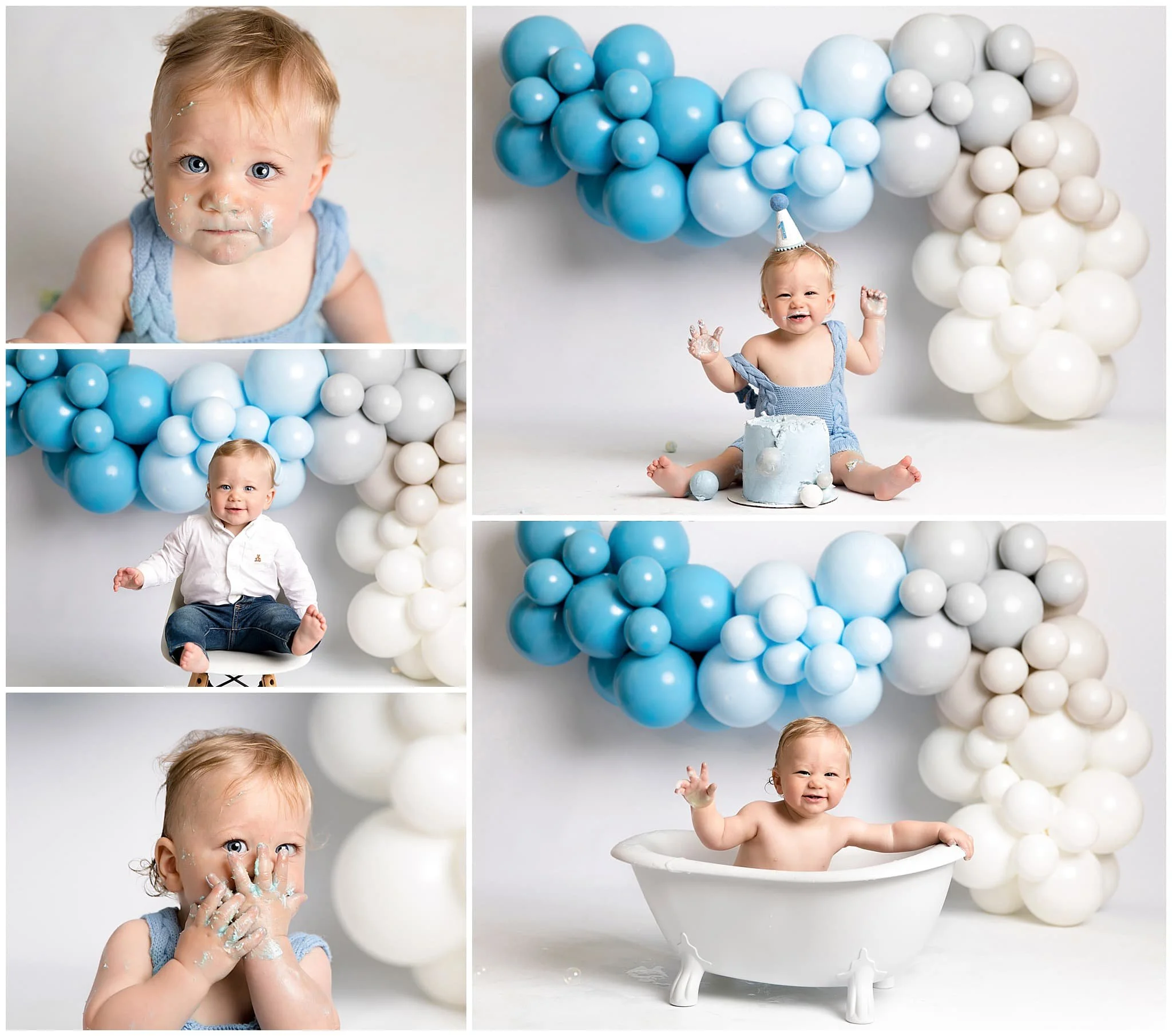  Smiling baby enjoying first birthday cake by a blue ombre themed balloon garland 