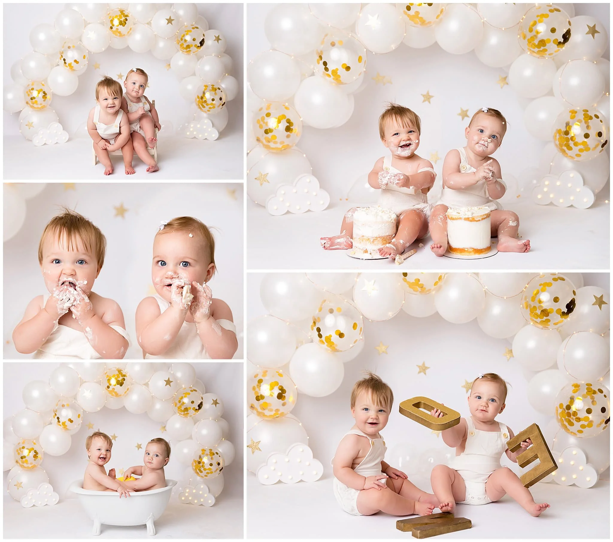  Boy and girl twins sitting in front of white and gold balloon arch and eating cake 