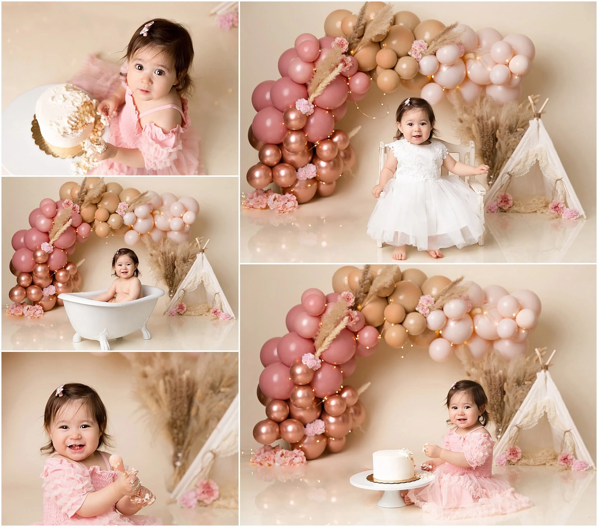  One-year-old sitting with cake in front of a boho style set with balloons, flowers and a tent 