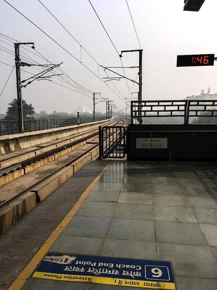 Nehru Place Metro Station two weeks later (notice how visible the Lotus Temple is to the left of the tracks).