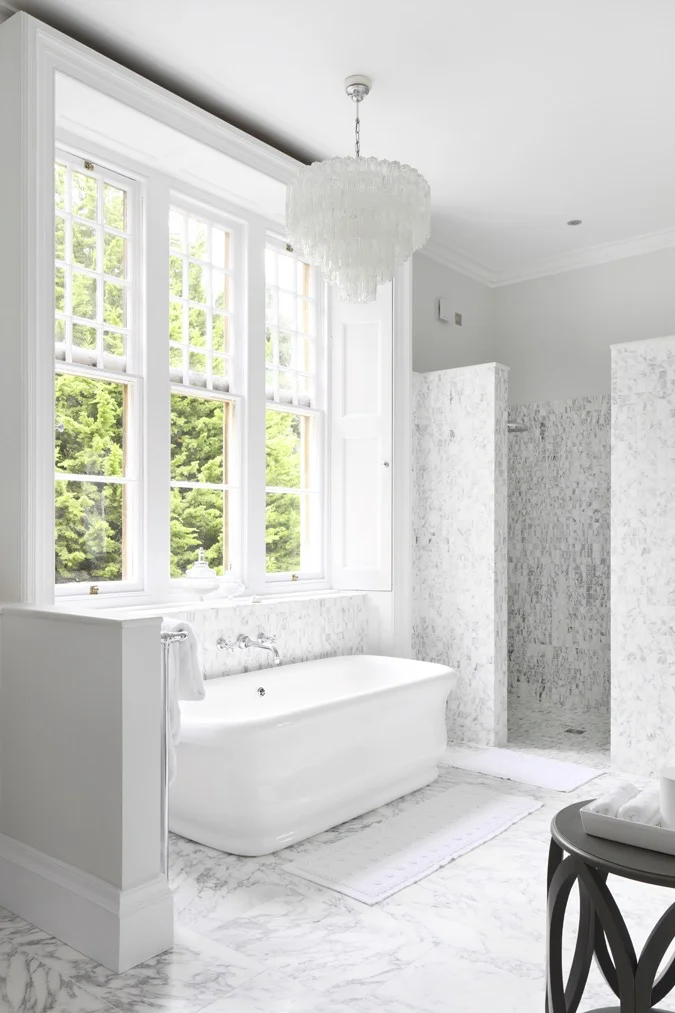 This is from our project The Manor House in the cotswolds. This bathroom is a refined and luxurious design, we like that the marble floor and tiles fit perfectly with the classic design of the manor. Click here to see the entire project .