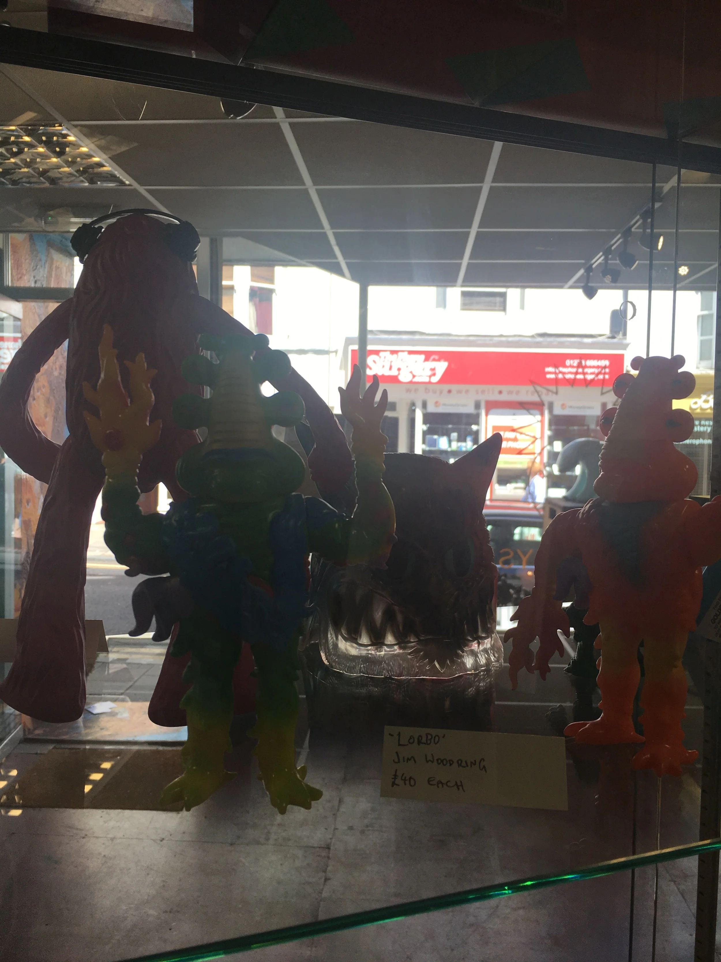 Some of the cool art toys in Dynamite Gallery