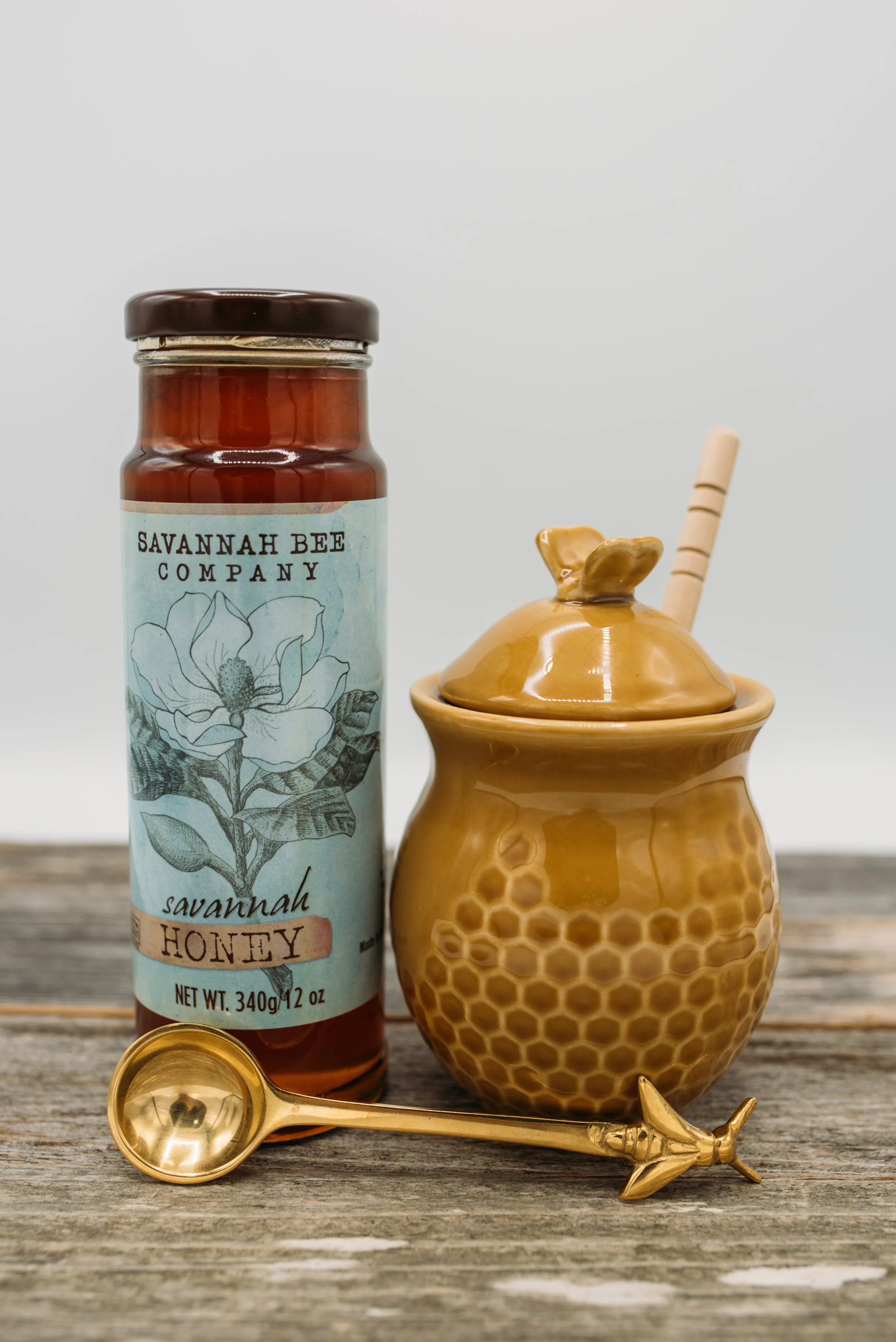 Savannah Bee Co. Honey -$13.45 Honey Spoon -$5.50 Ceramic Honey Pot -$10.95