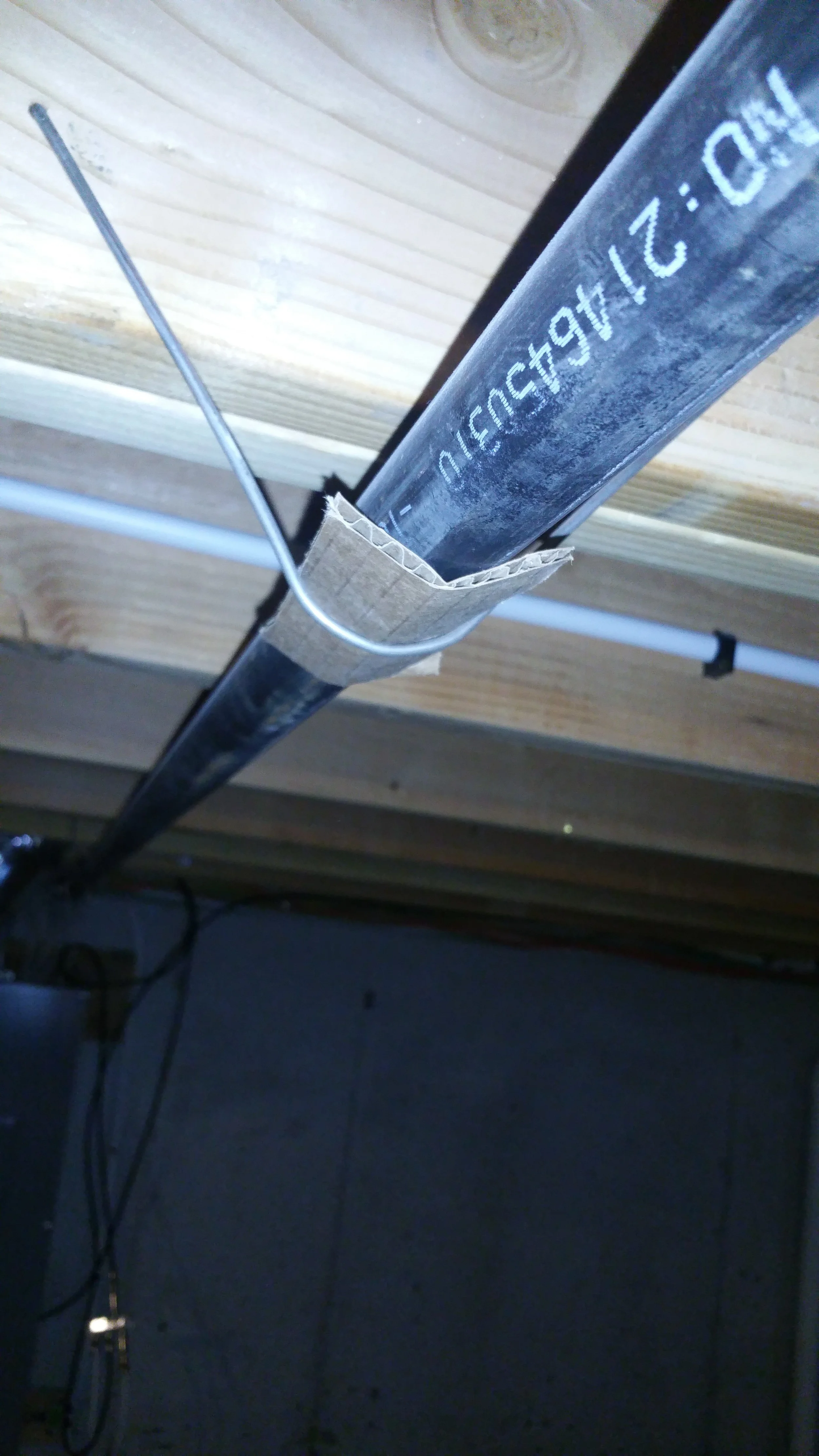 Not a big deal, but typically cardboard isn't part of a gas line hanger