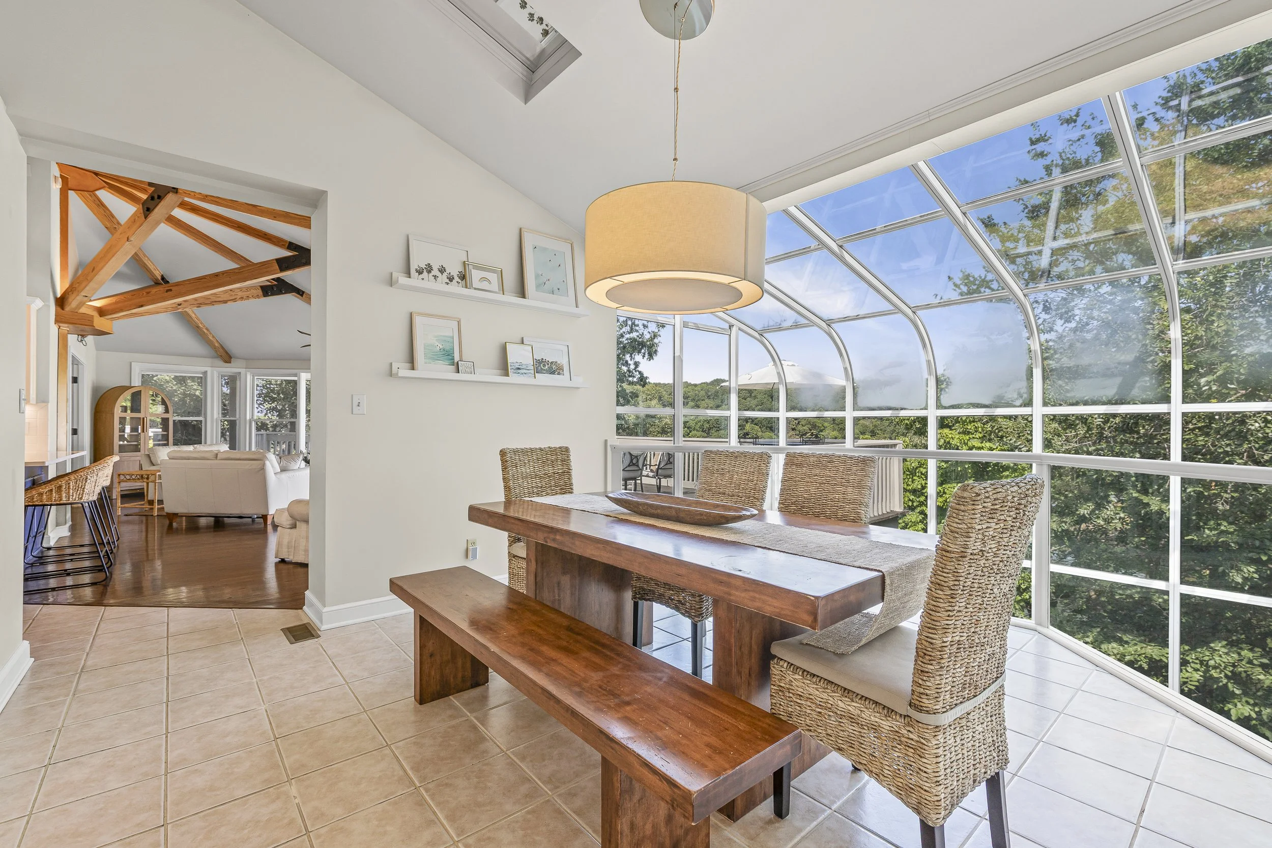 A nice image of a dining area overlooking some trees