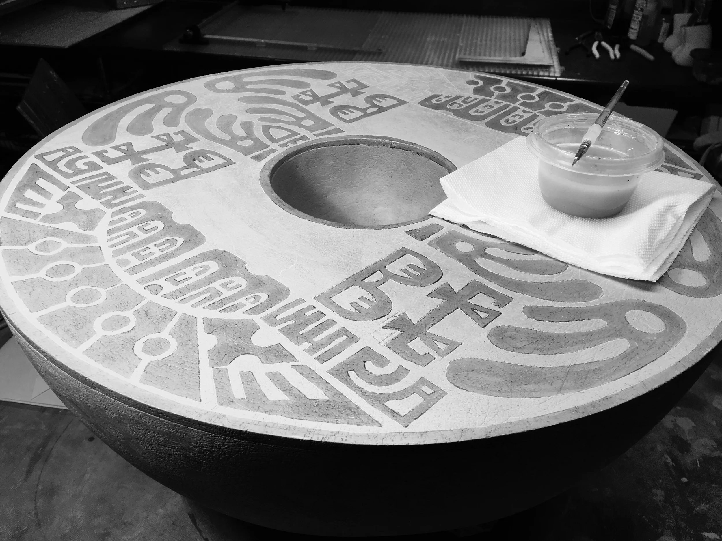 Shellac design is brushed on before sponging relief design