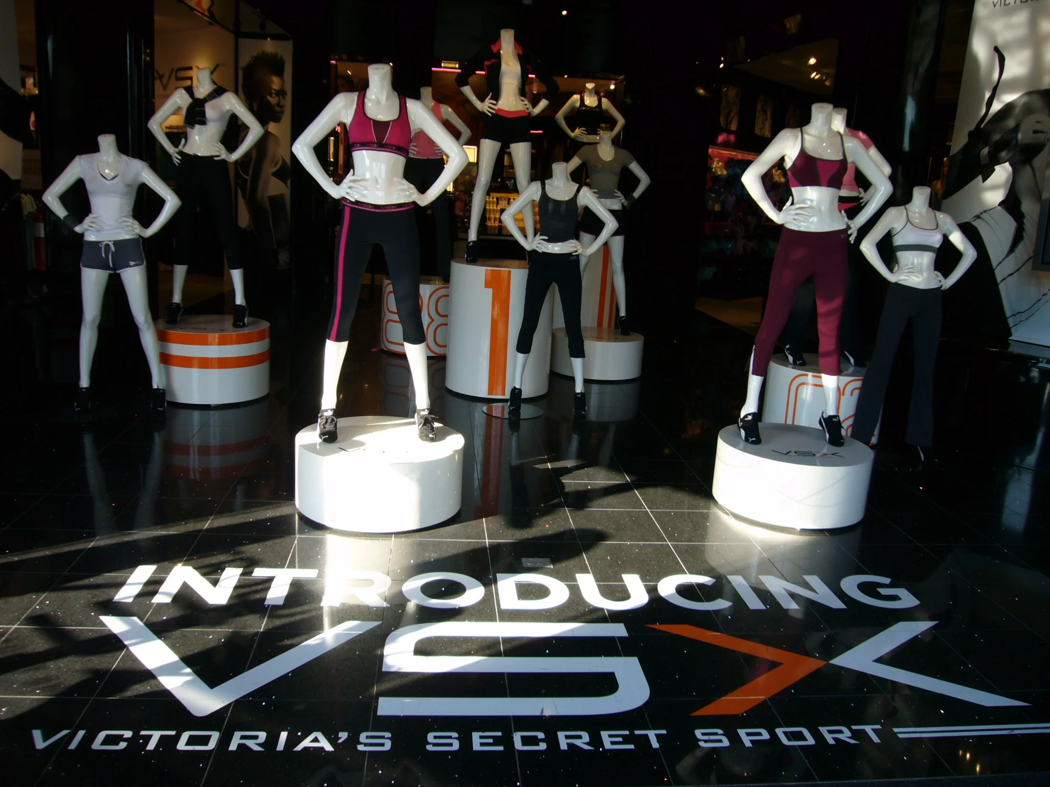 printed graphics + 3D visual merchandising elements 