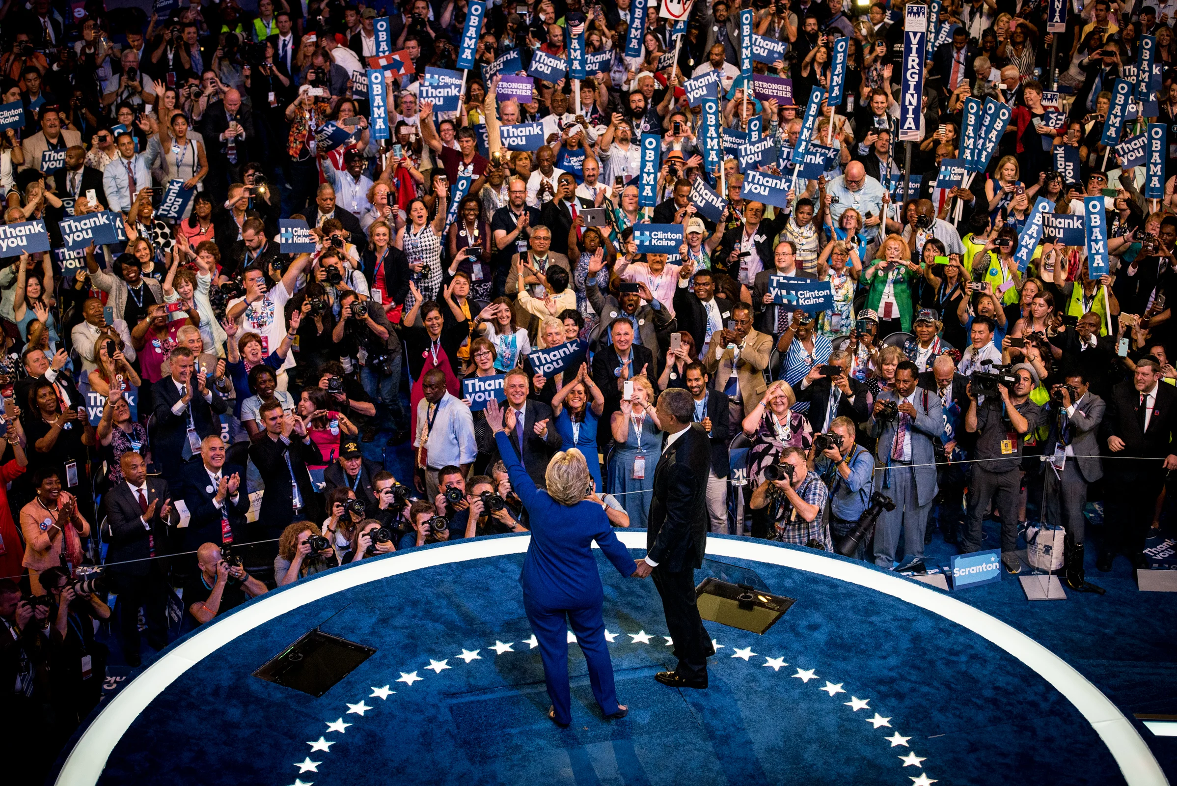 Democratic presidential nominee Hillary Clinton walks on to the platform with President Barack Obama after his speech during the Democratic National Convention at the Wells Fargo Center in Philadelphia on Wednesday July 27, 2016. (Michael Ares / Philadelphia Inquirer)
