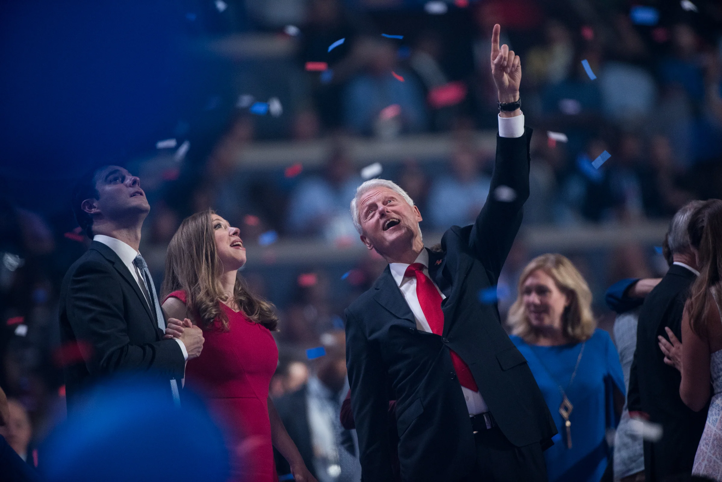 Former president Bill Clinton points to balloons released at the end of the Democratic National Convention inside the Wells Fargo Center in Philadelphia on Thursday July 28, 2016. (Michael Ares / Philadelphia Inquirer)