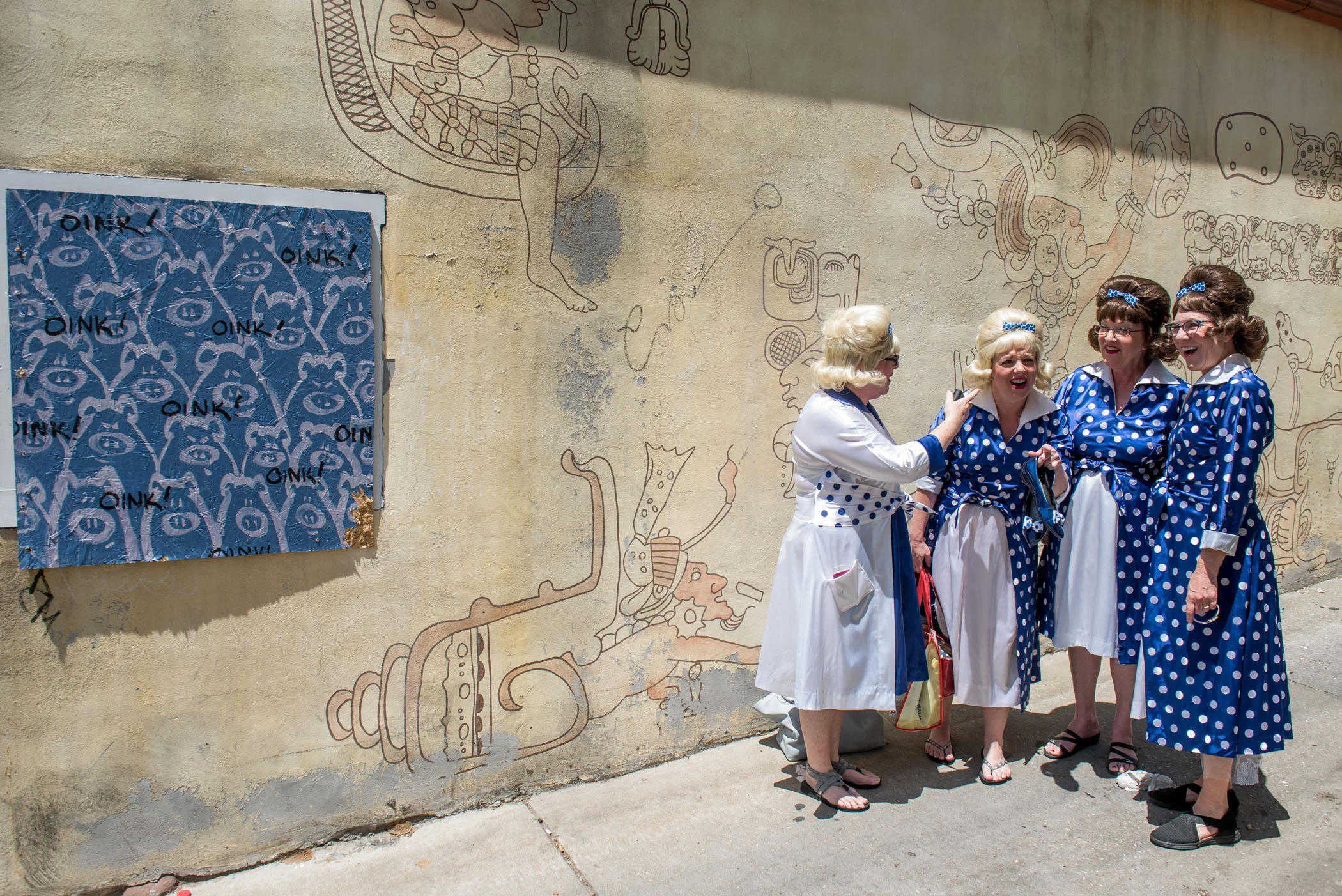 Ladies from the Harbor City Music Company practice songs in an alleyway before performing at HONfest in Hampden, Baltimore, Md., on Saturday June 10, 2017. (Michael Ares / The Baltimore Sun)