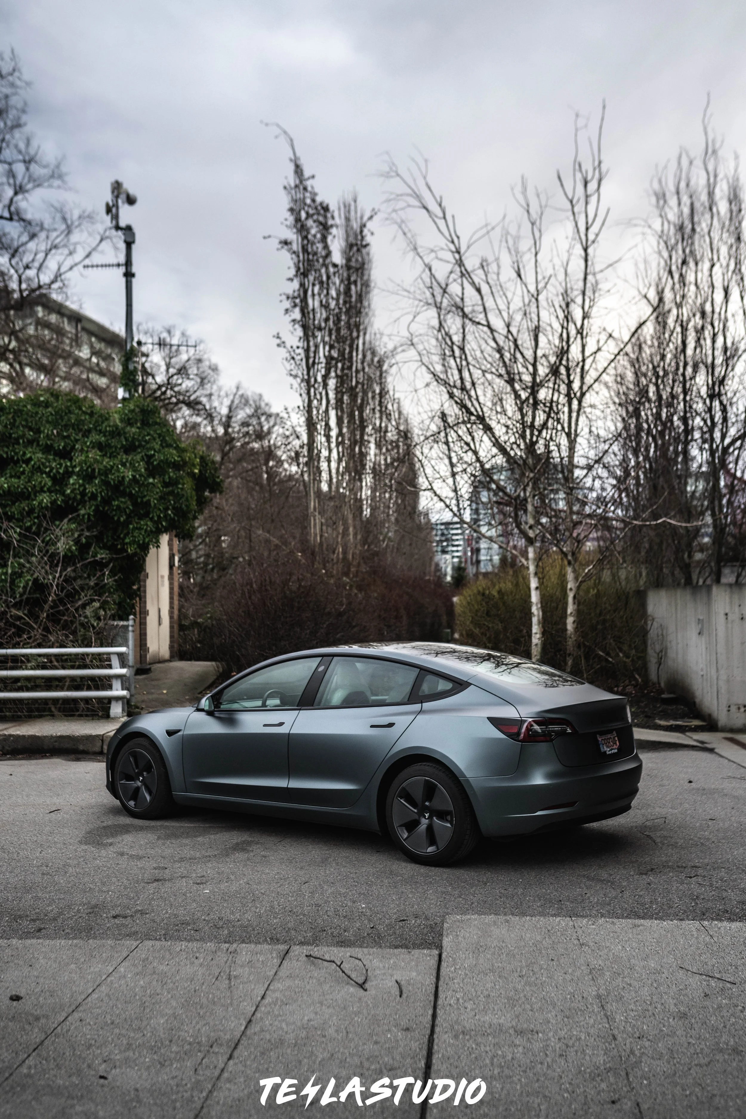 Model 3 vinyl wrap in Matte Grey Blue