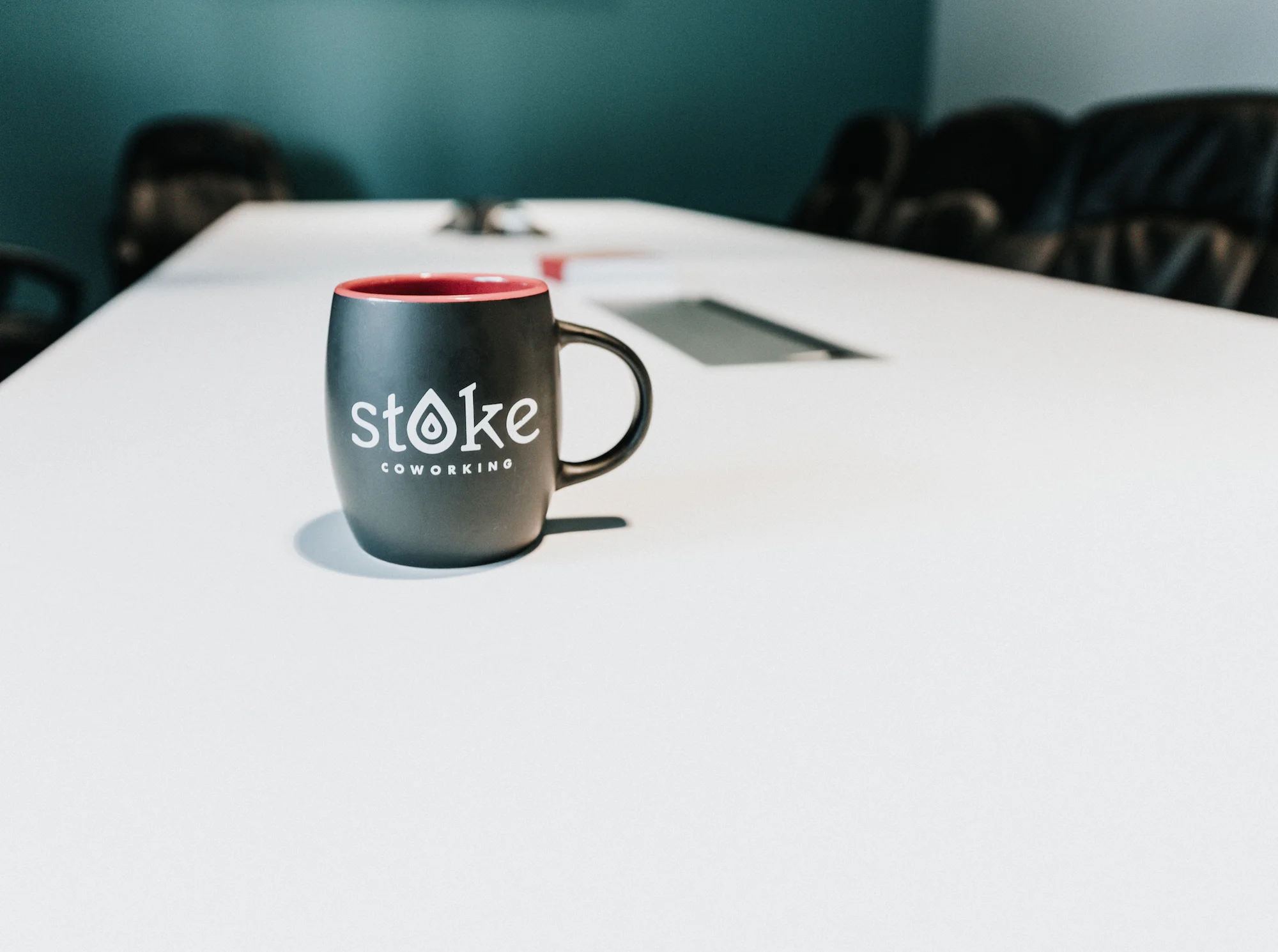 Stoke coworking mug in conference room 3.jpg