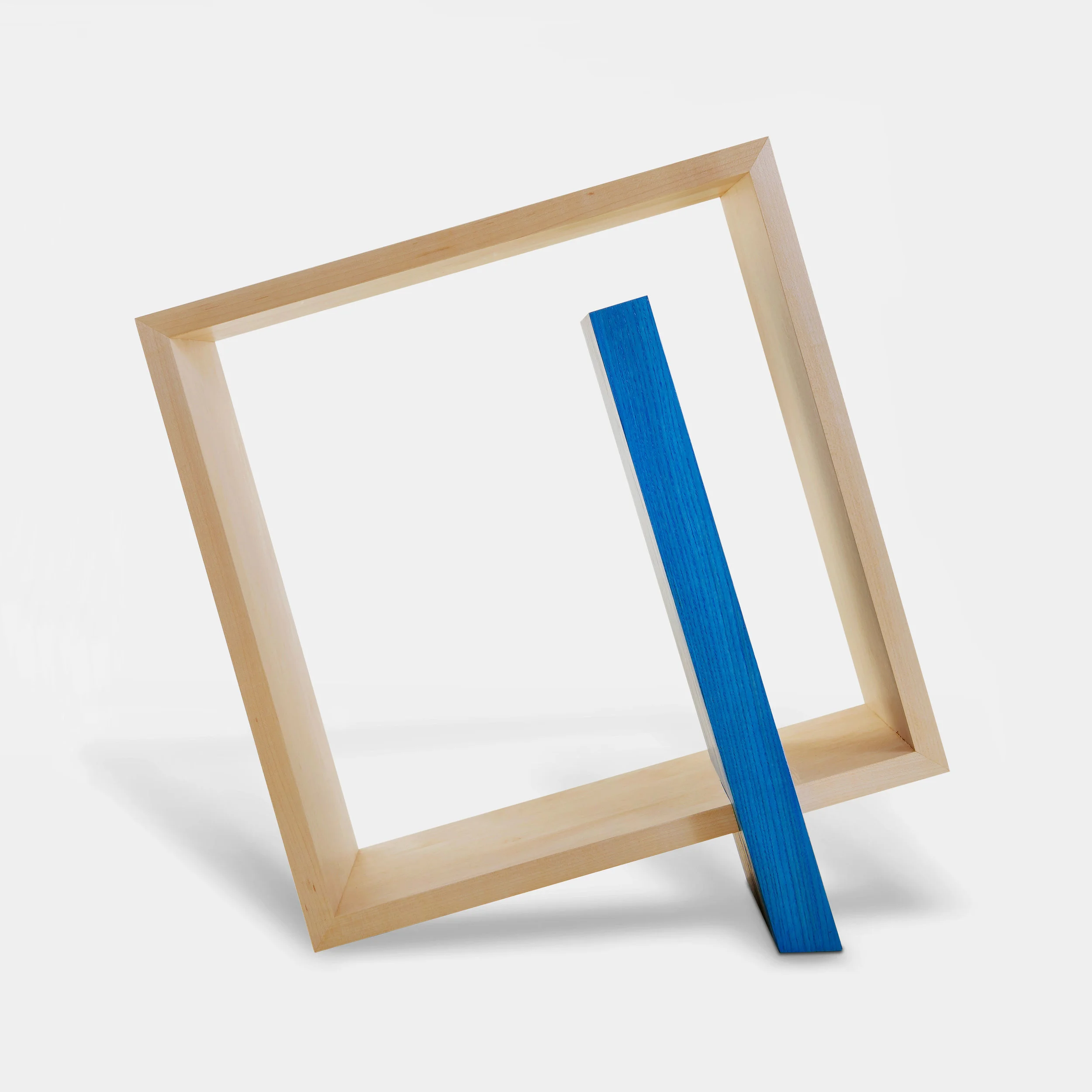 Q frame in solid maple with a blue stained ash spoke