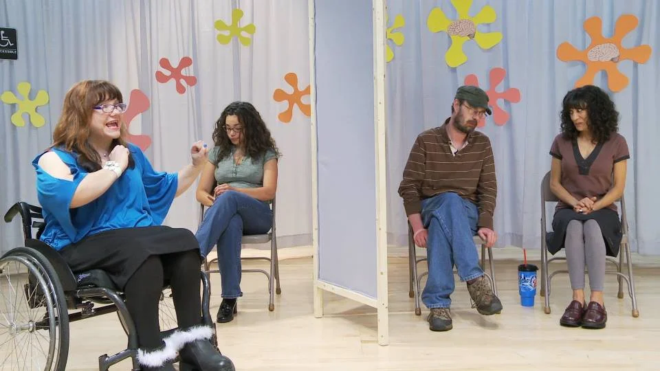 Like many people with a brain injury, Bill and Cheryl lost their social connections. They attempt to win a friendship with Jacqui on a surreal daytime TV show. Things go awry when the host tries to run things her way. The contestants have all had traumatic brain injuries in real life. They bring their experiences with social isolation, stigma, and communication difficulties to this short comedy film. "Friending with Brain Injury!" c reated in collaboration with brainreels films http://storyminders.com/film/