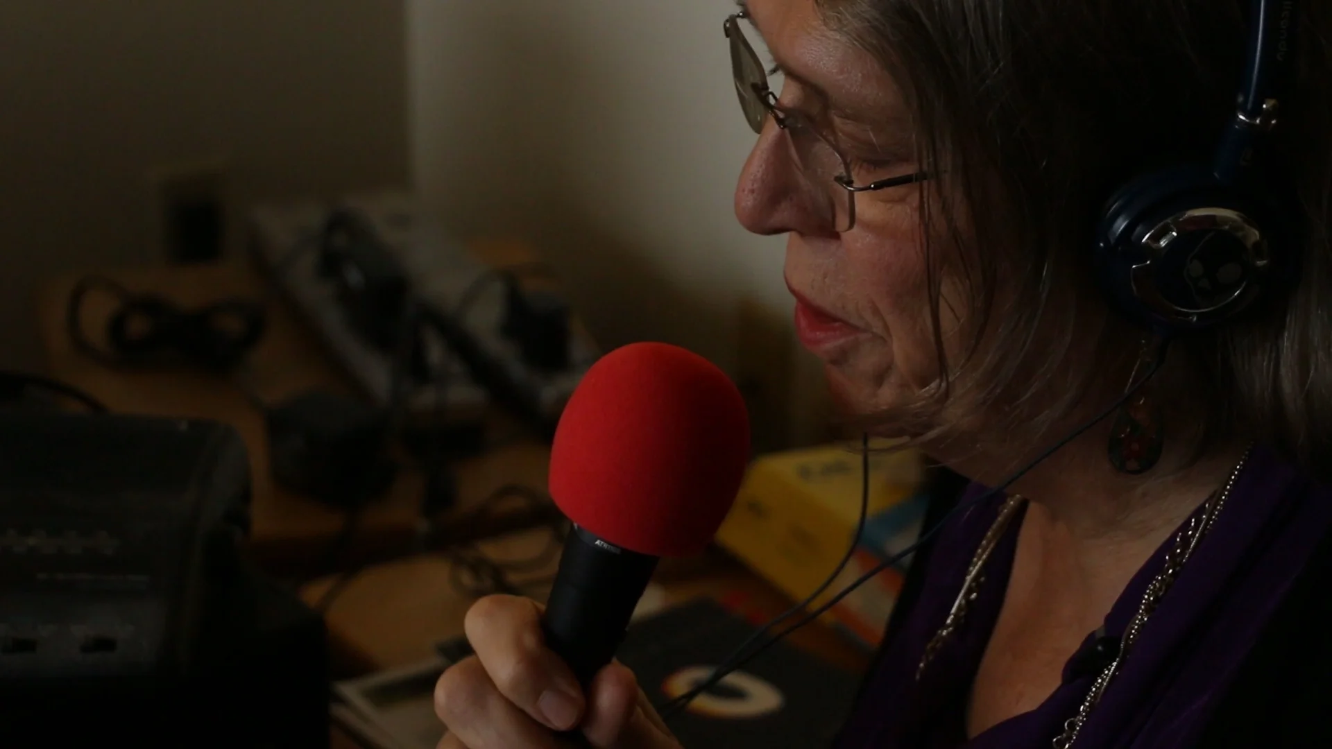 Emily reading one of her poems for a podcast.