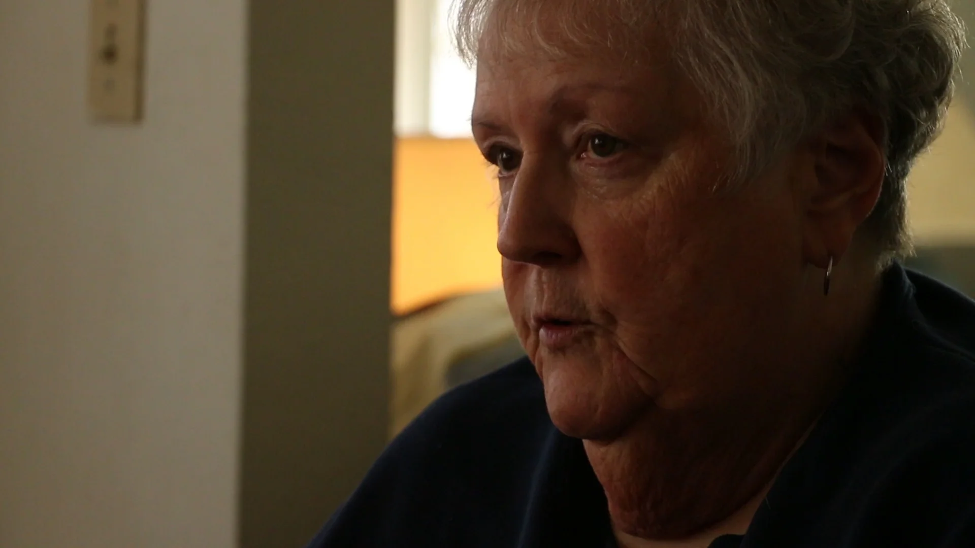 Sherian shares stories over homemade soup and biscuits with her husband and friends.