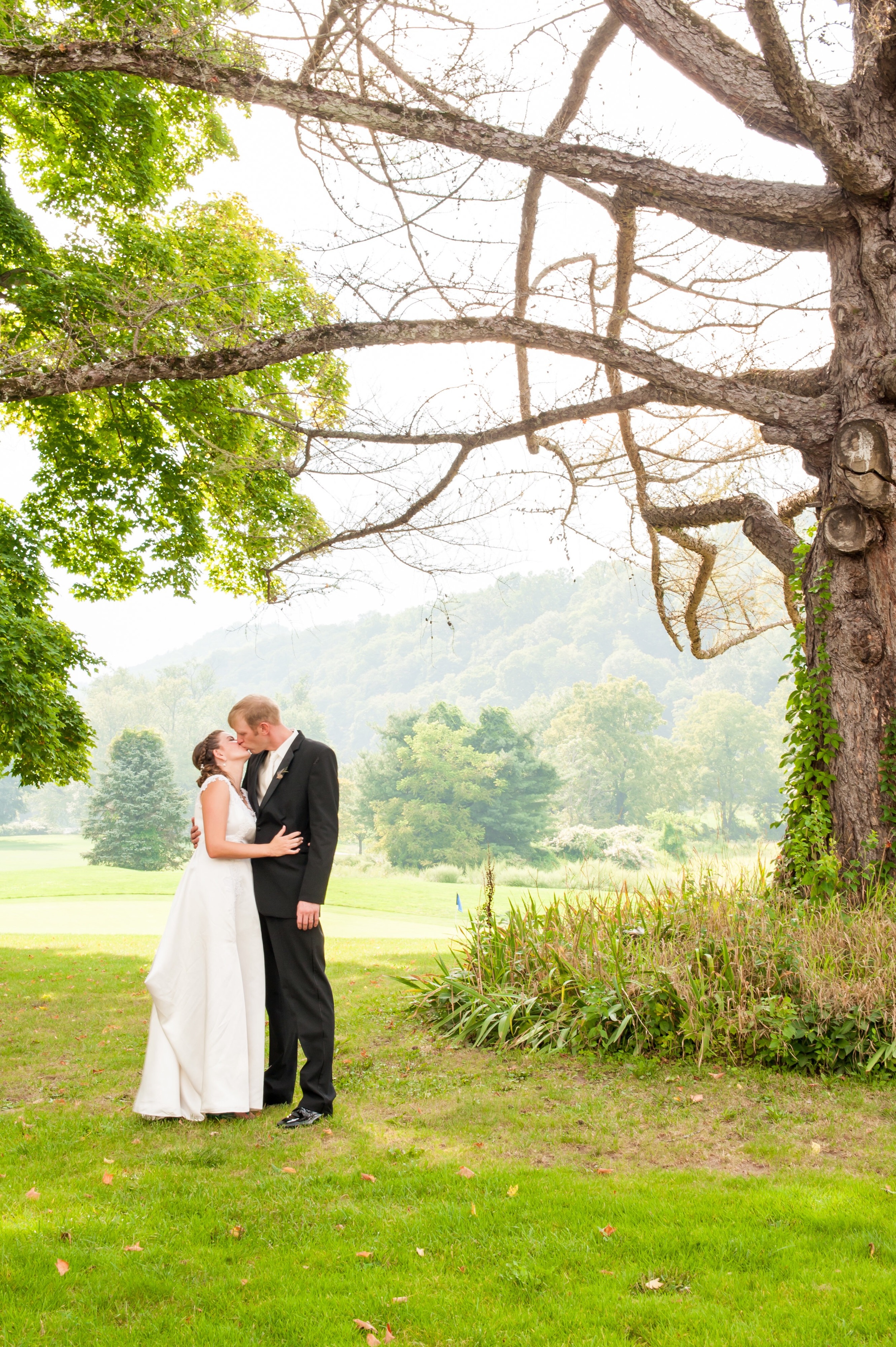 Bride and Groom Under Tree at Shawnee Inn, Pennsylvania