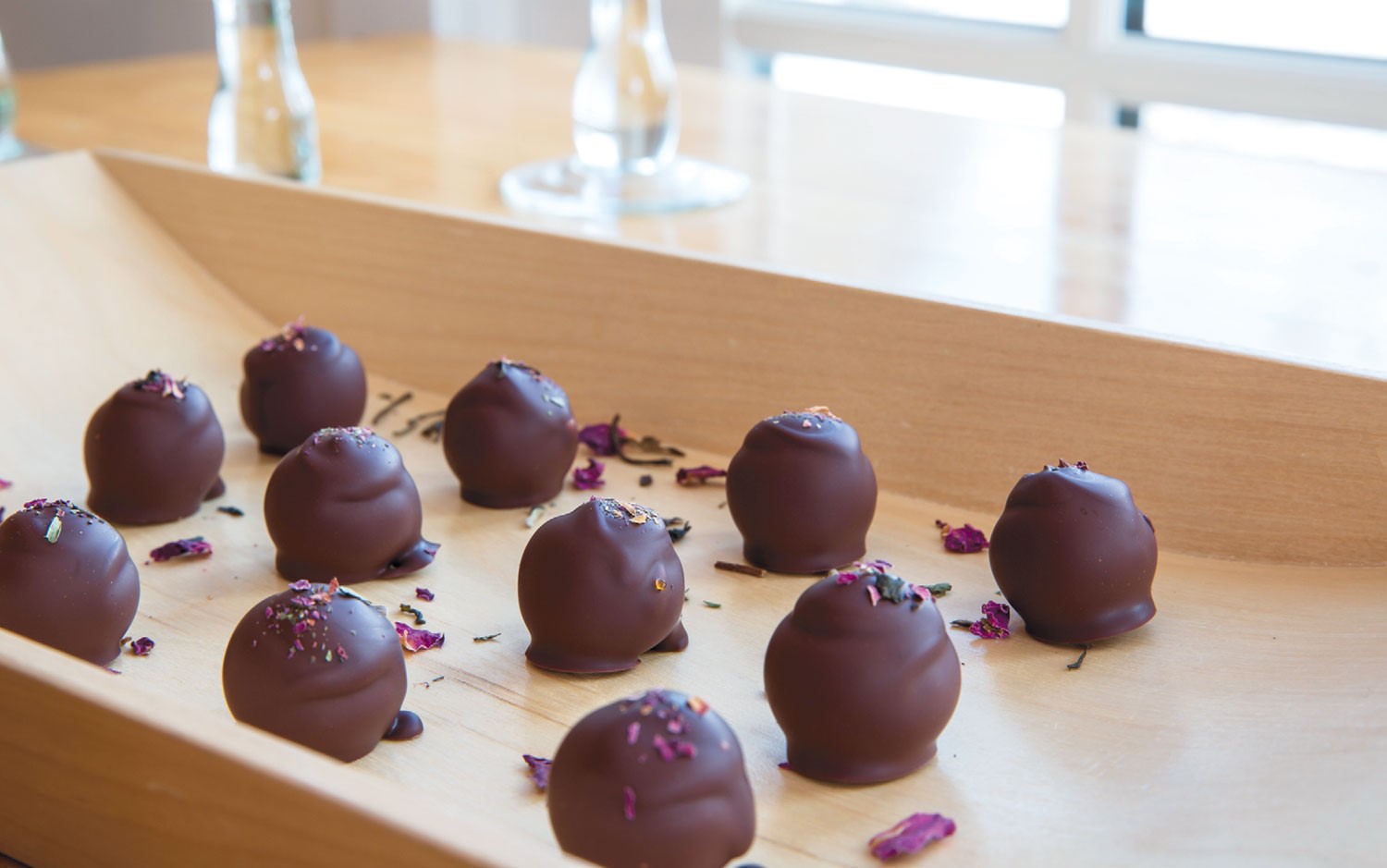 Photo 2: Truffles in nearly a dozen varieties are infused with different delicate tea blends, like La Vie en Rose with its subtle expression of summer roses finishing with a hint of mint