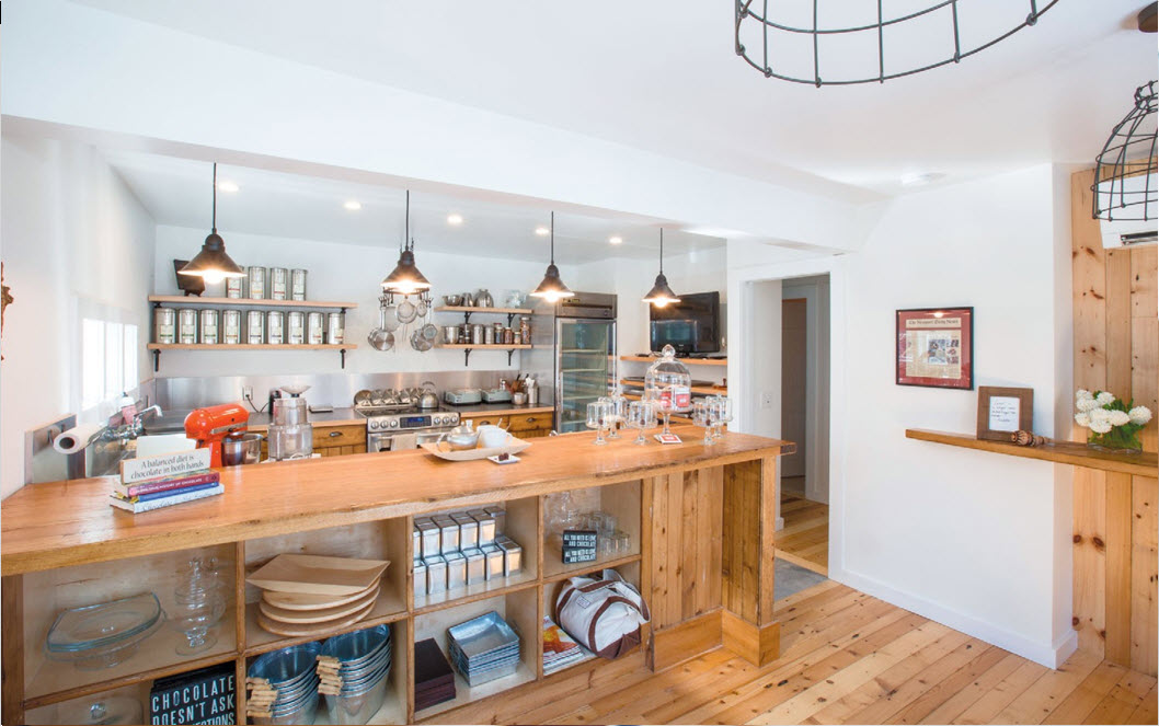 Photo 1: Michele’s husband, architect Cyril De Luca-Verley, designed the kitchen atelier, converting their old barn into a sleek new workspace for La Maison de COCO.