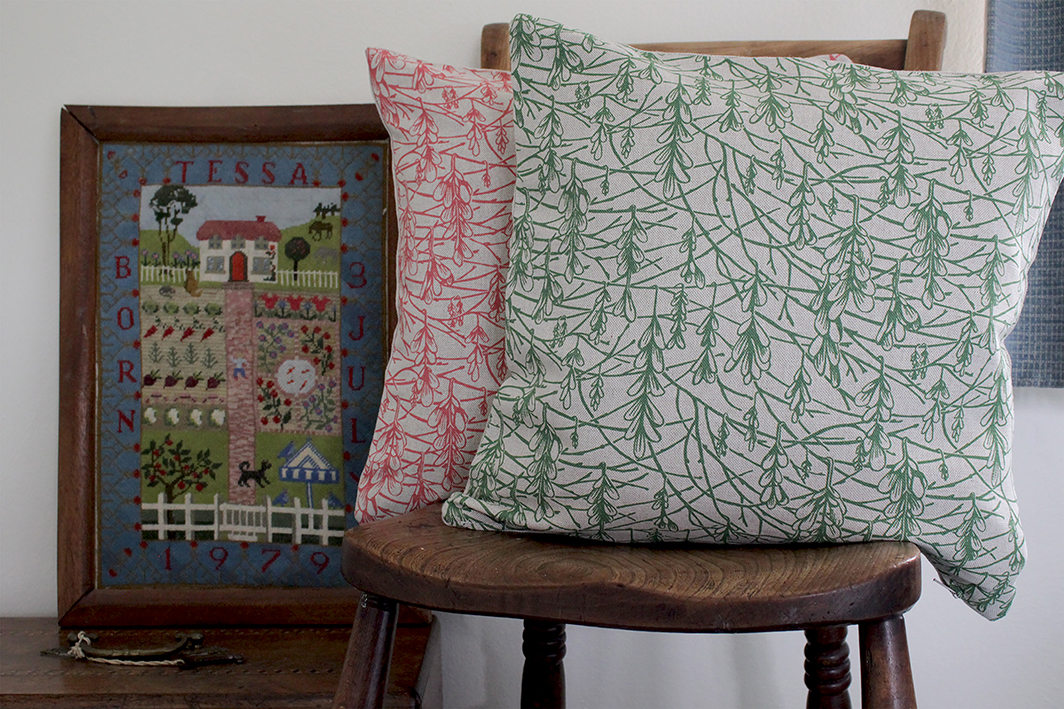 SH_Sycamore_GrassGreen_Coral_Cushion1.jpg