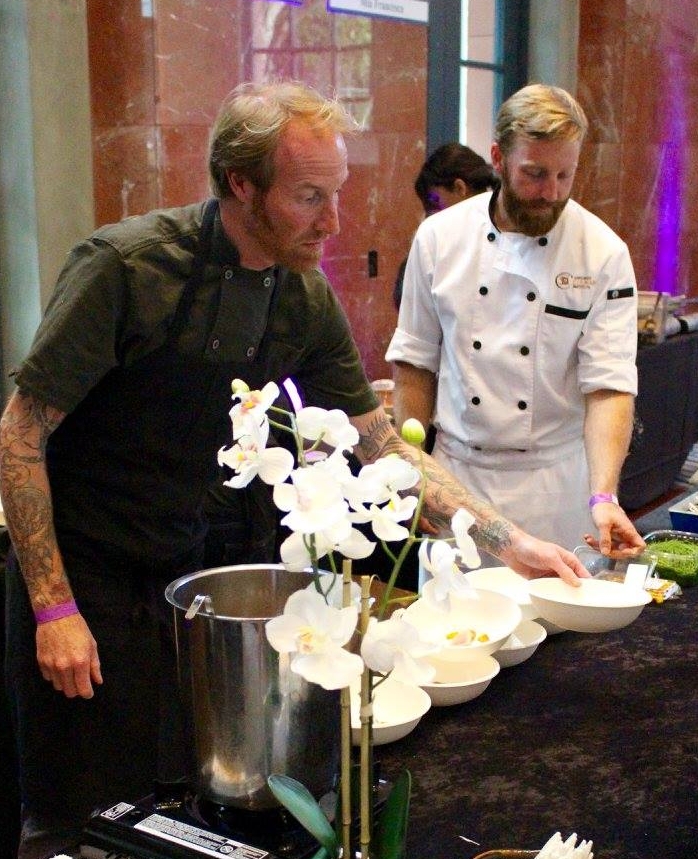 Chef Davin and a volunteer chef working hard to make sure guests are well fed! 