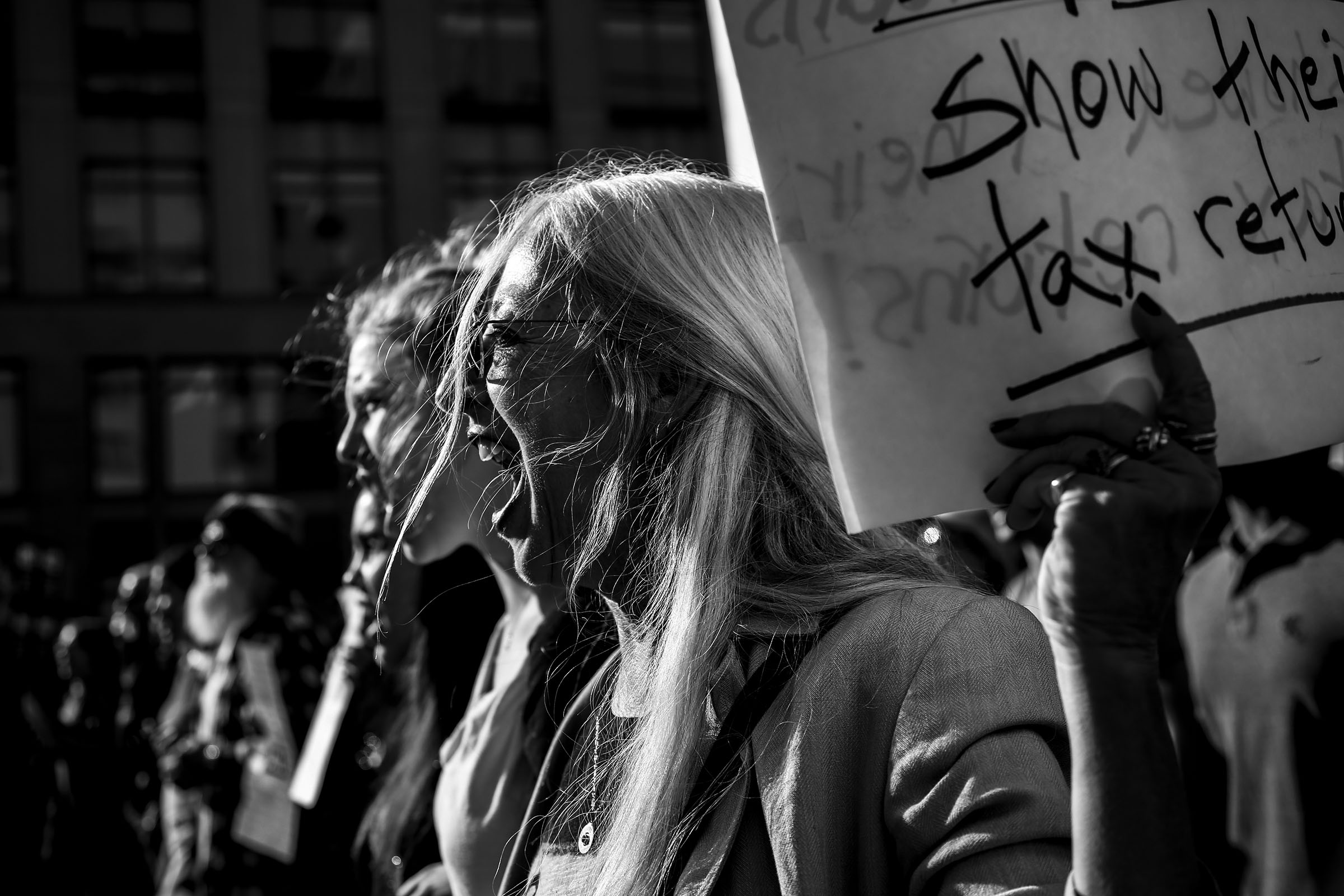   Protesters take part in the "Not My Presidents' Day" protest in DC.  