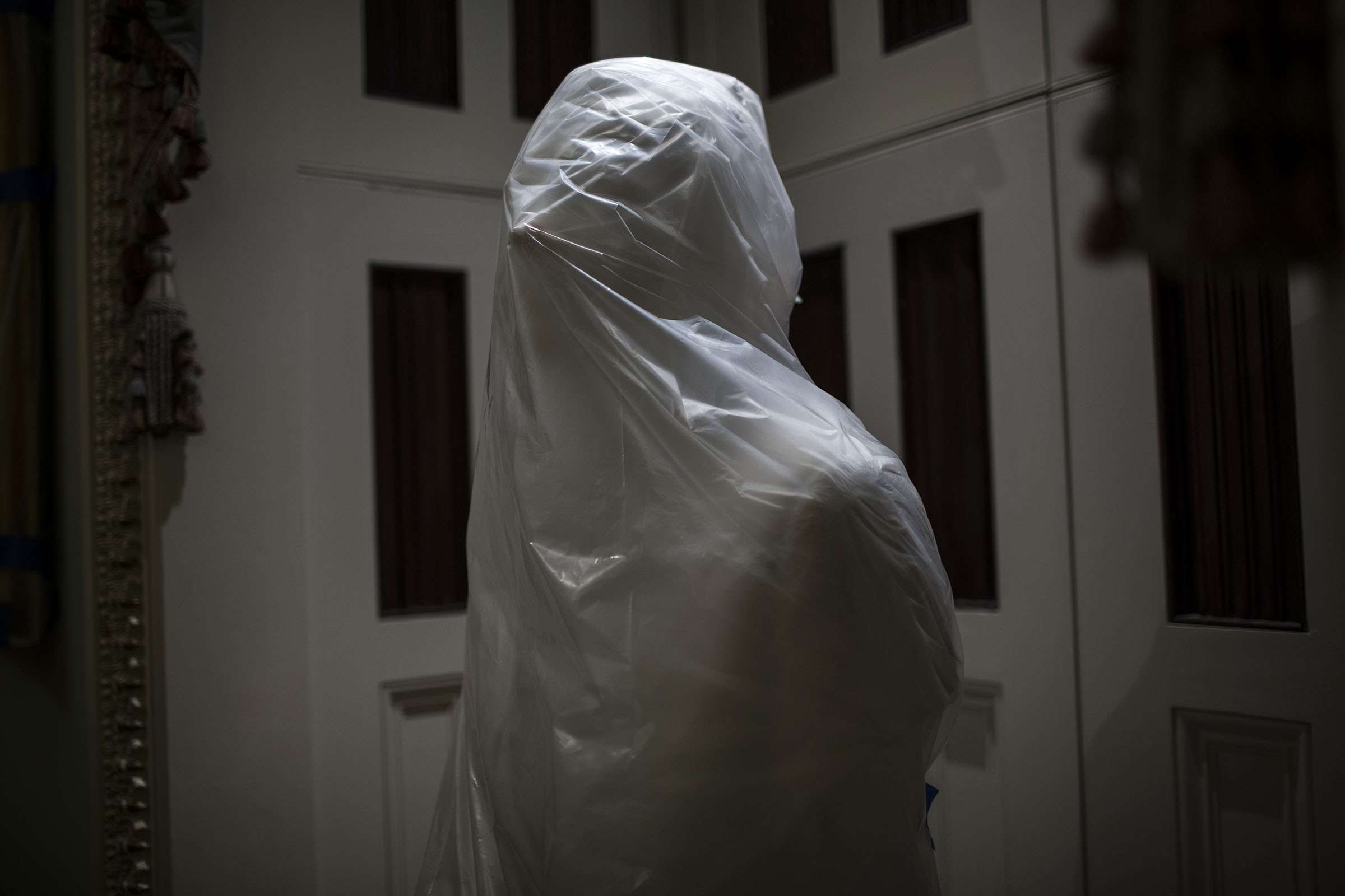   The bust of Richard Nixon is wrapped with plastic for their protection during the testing of the new Smoke Control System in the Capitol.&nbsp;  