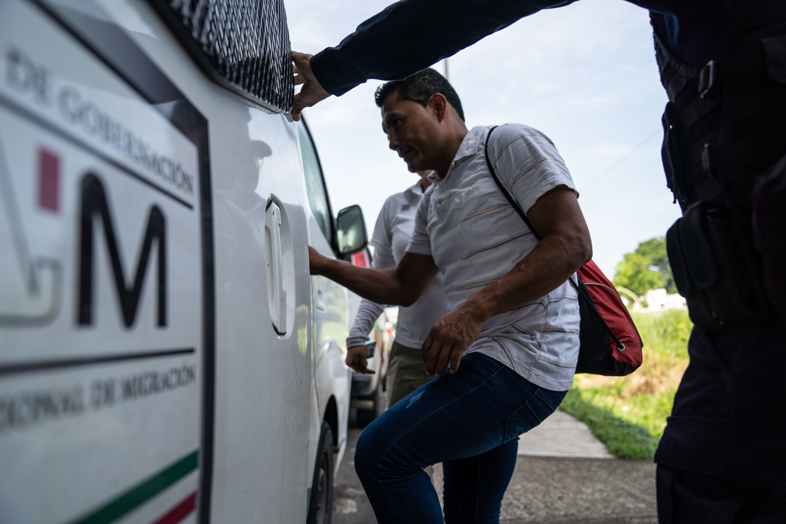   An undocumented migrant is detained at a checkpoint in Tapachula, Mexico in June, 2019.  