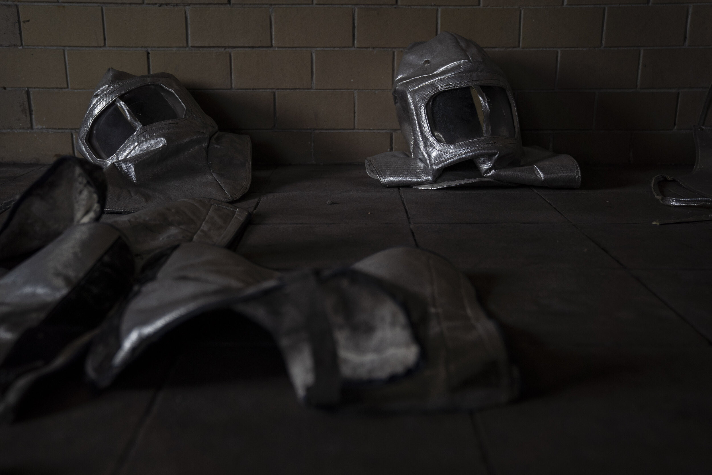   Workers' protective gear wait to be disinfected at a crematorium at Panteon Municipal in Ciudad Nezahualcóyotl.  