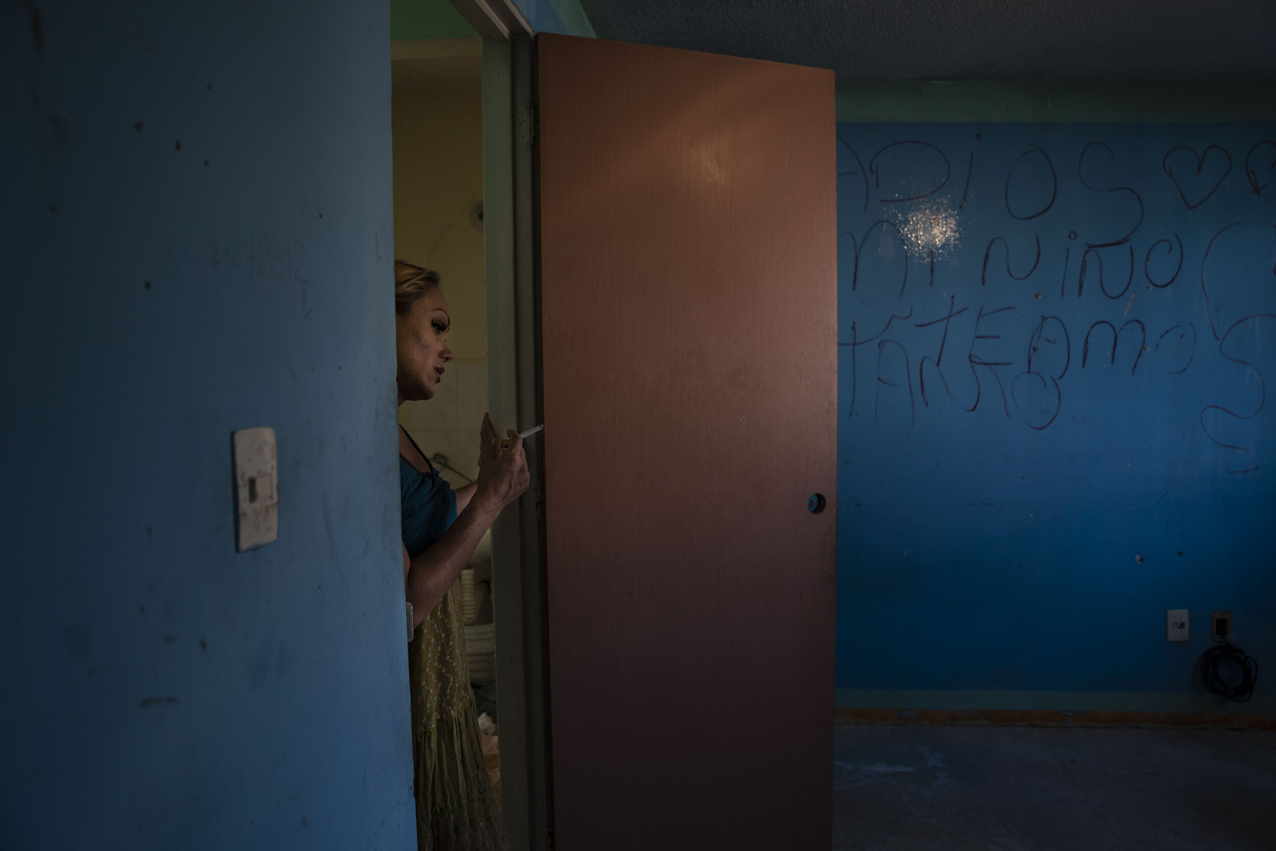   Nicky looks on in her new bedroom in Chalco, State of Mexico.  