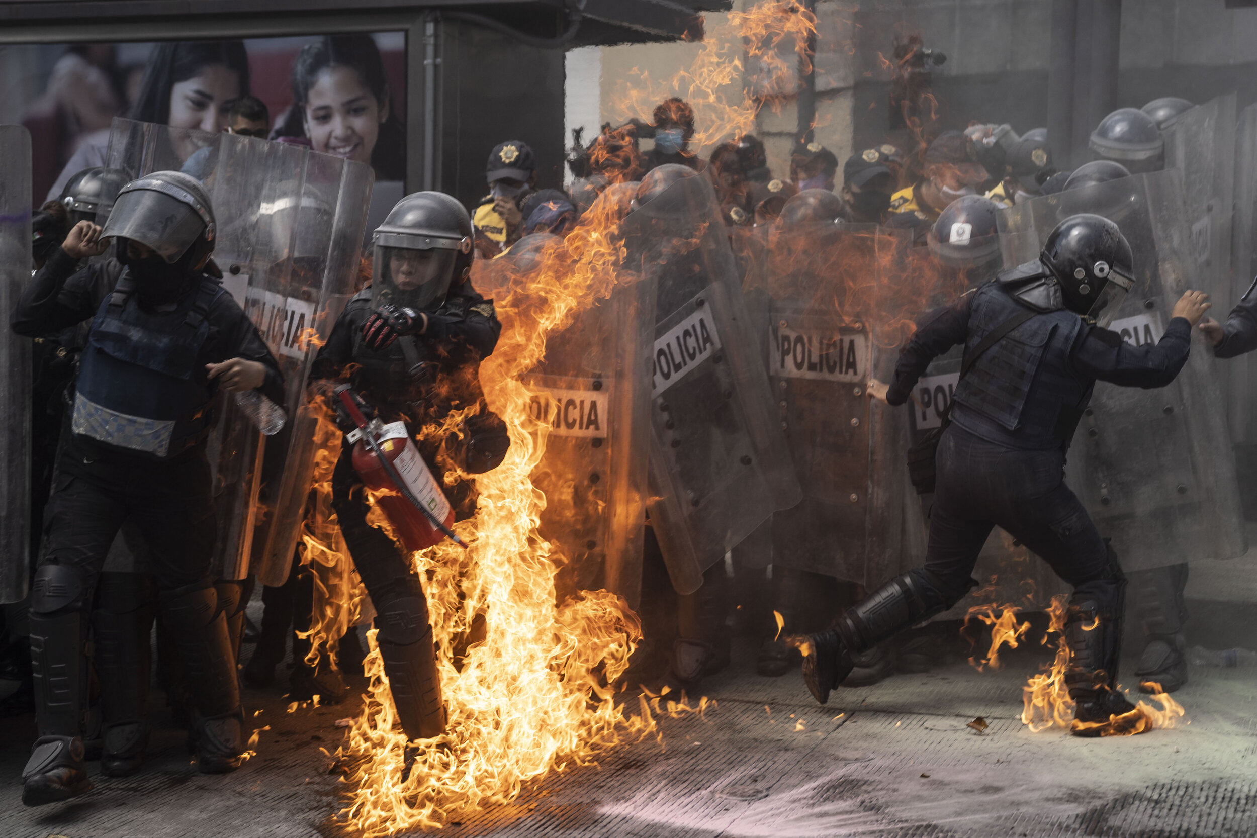   Riot police clash with a feminist collective during a protest in favor of abortion rights, Mexico City  