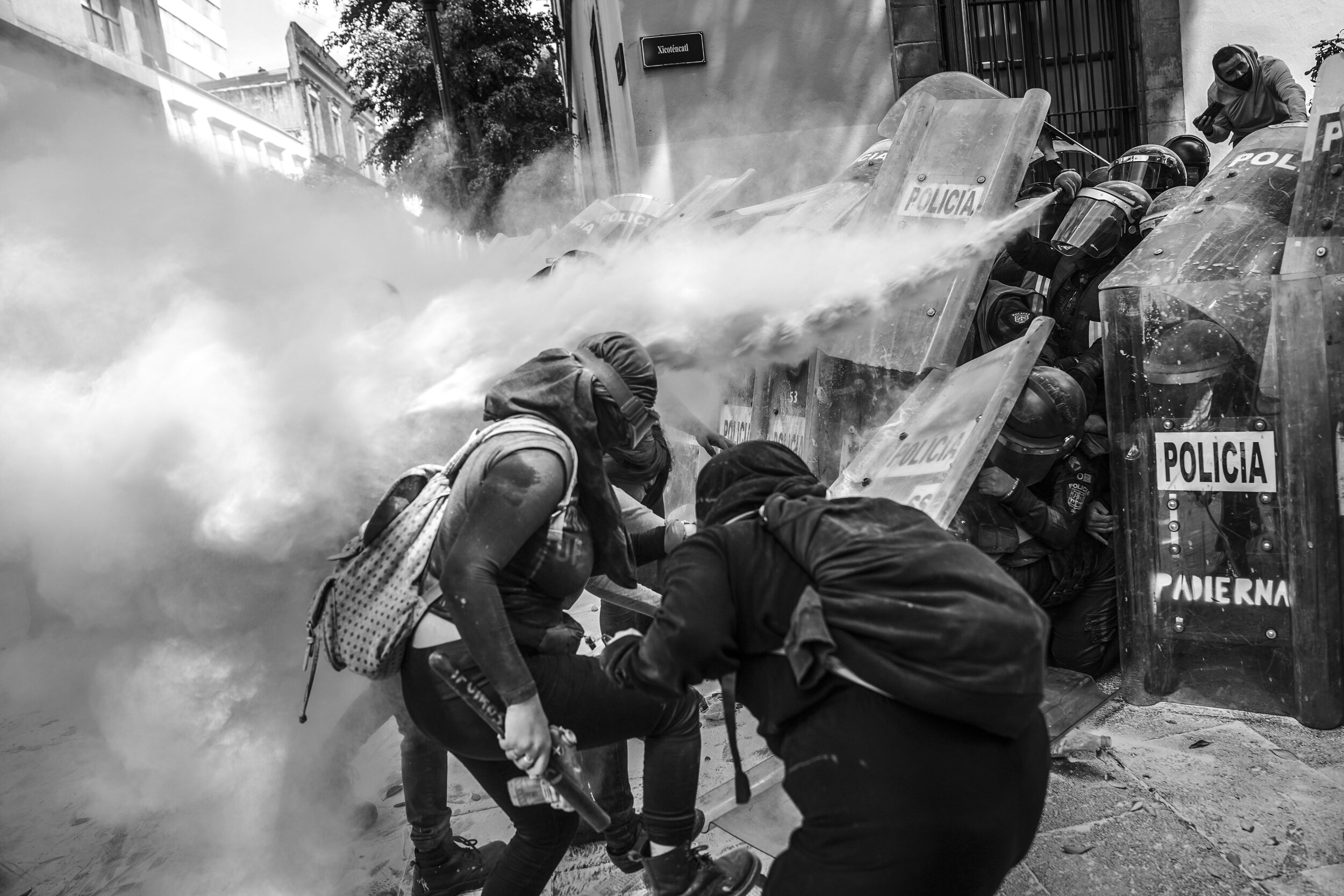   A feminist collective clashes with riot police during a protest in favor of abortion rights, Mexico City  