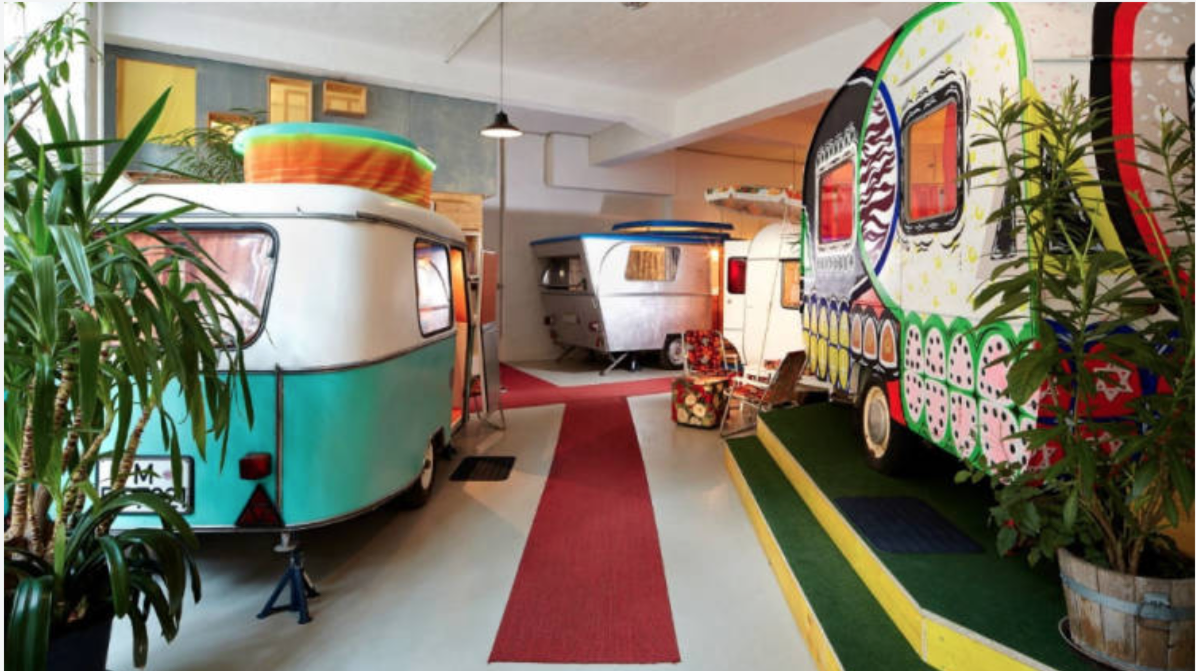 Indoor caravan park-hotel turns camping into a luxury experience