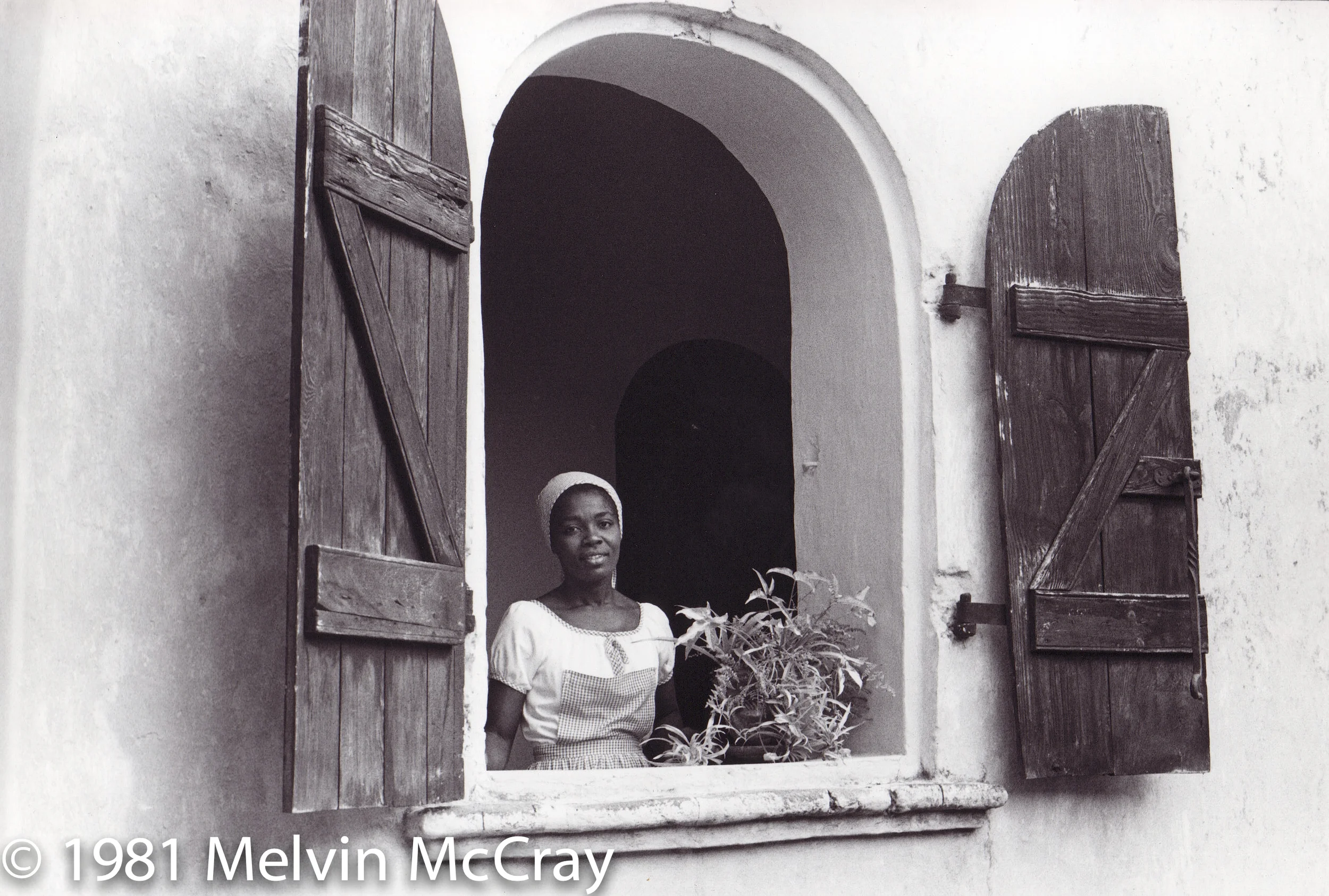 Haitian Woman in the wondow with infocus-.jpg