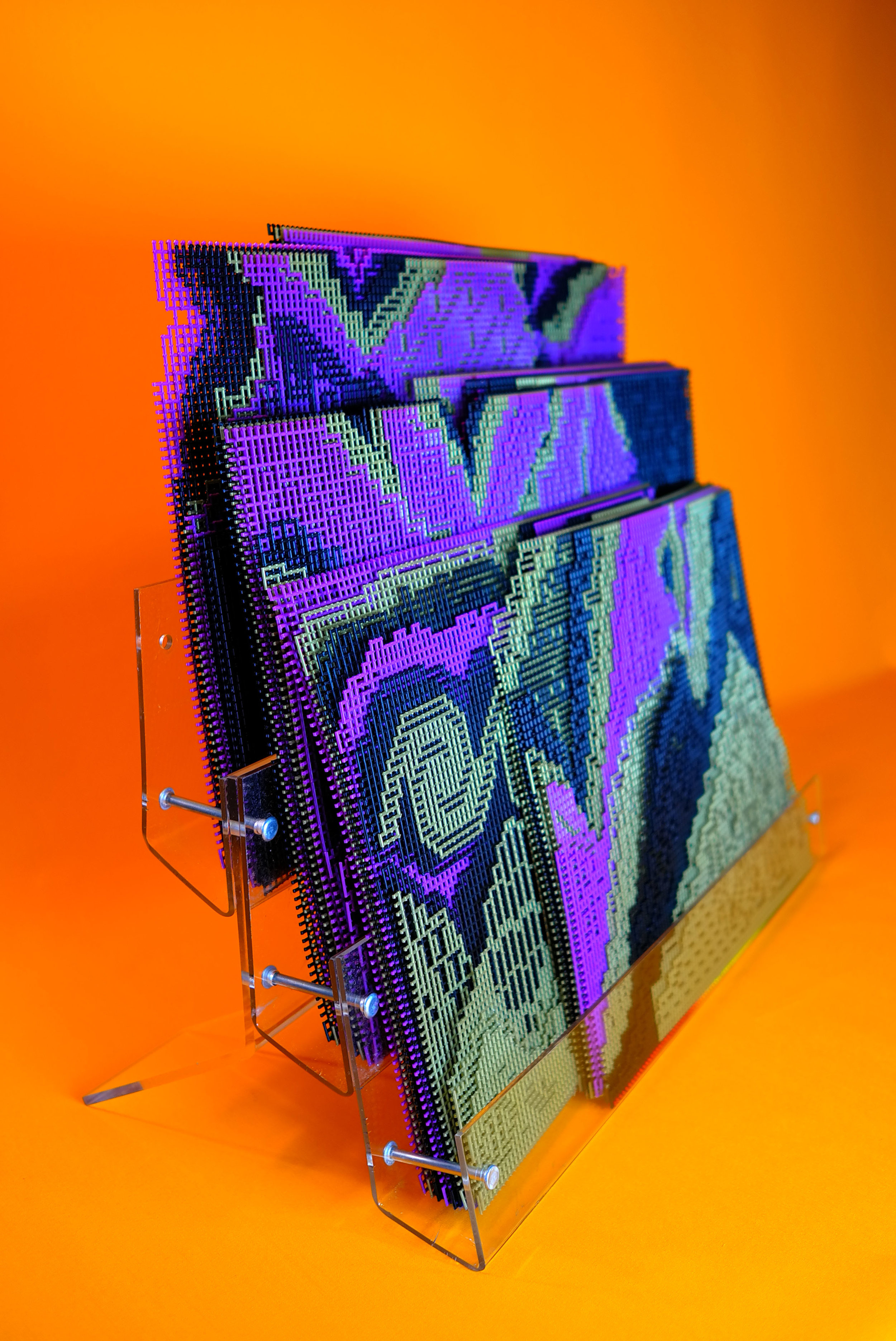Fig. —1 Color plate Pattern Erosion , 2018; carved raised mesh canvas, whip stitched gradient binding, 36 signatures, 72 plate units, approximately 11 × 13.5″, installation variable.