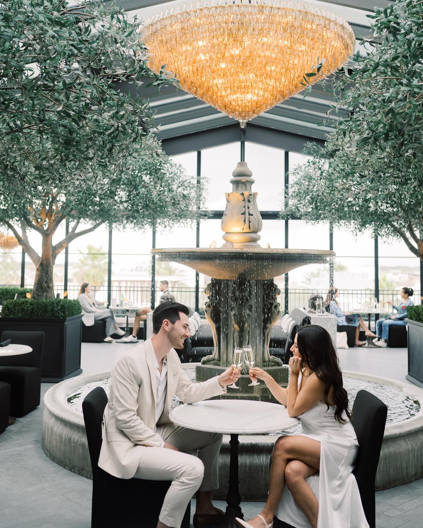 Bridget + Matt ✨ 
.
Bridget came to me with the idea of shooting in a restaurant. She wanted something non-traditional which I absolutely love! I immediately thought of RH Rooftop and @catalunajax for the locations. 
.
.
These two were dressed to per