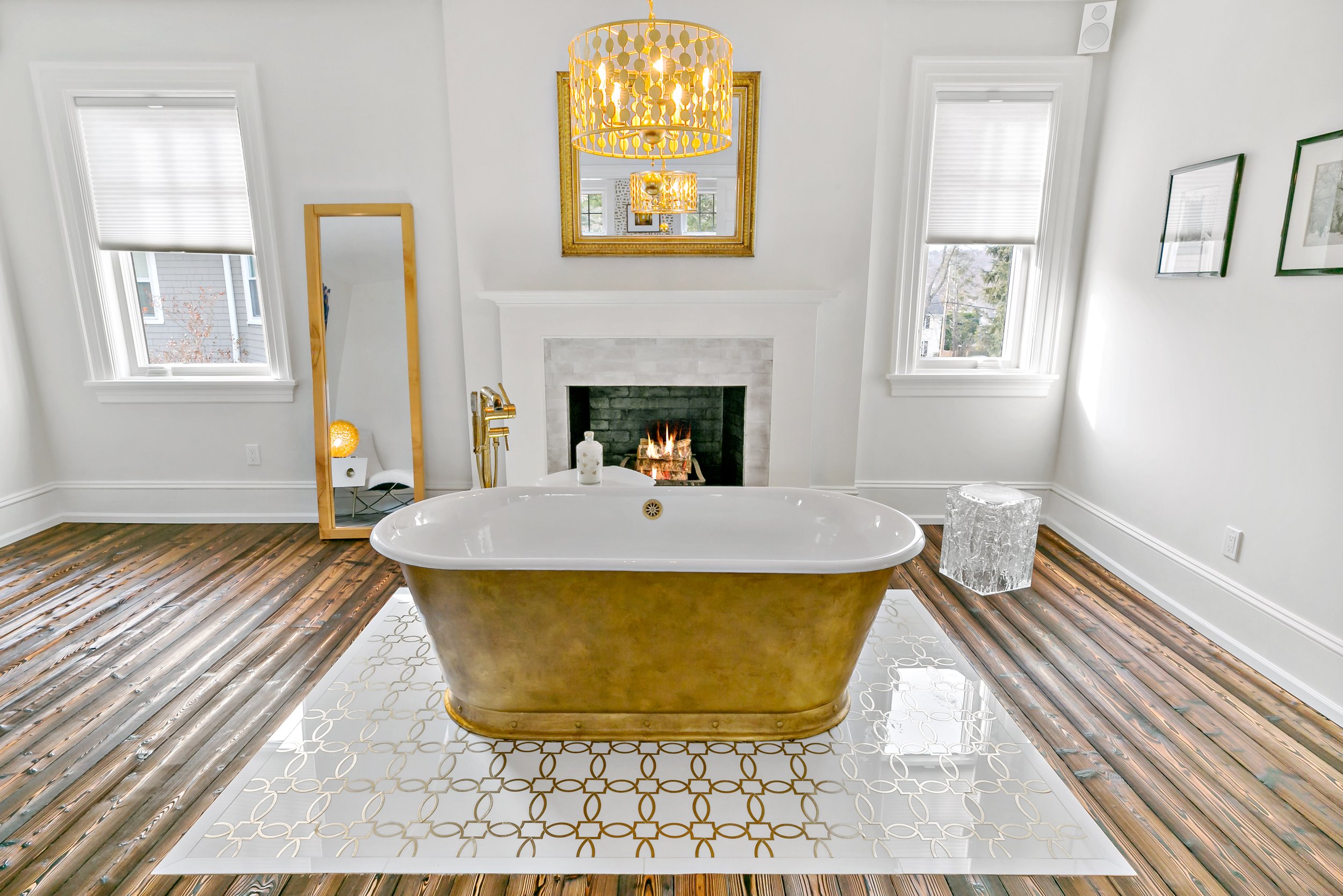 Pleasantville gold-leaf tub in bedroom