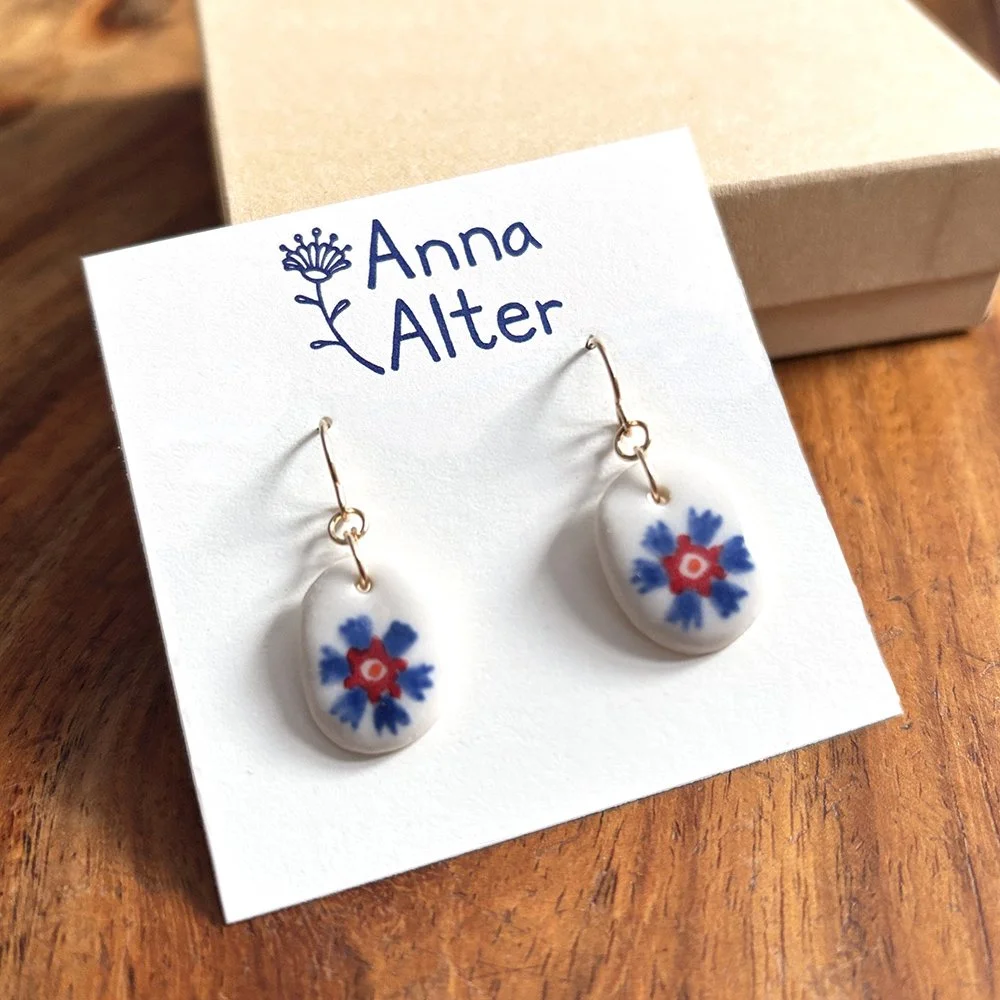 blue six petal hanging oval.jpg