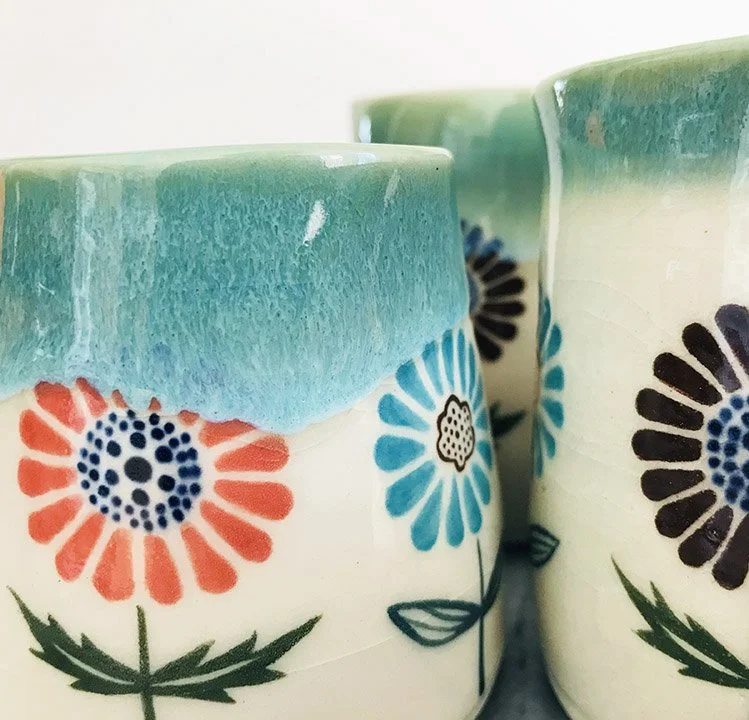 Flower ceramic pitchers by Anna Alter.jpg