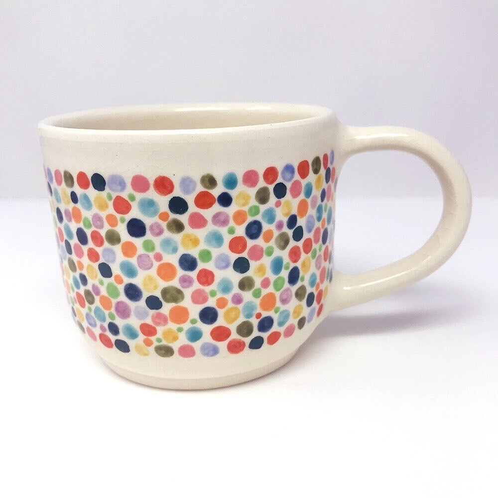 New dot mug up in my shop this week! A little color on a grey day ✨

#ceramics #pottery #underglaze #handmade #handpainted #craft #wheelthrownpottery #illustratedpottery #illustratedceramics #surfacedesign #dots #easthamptonclay #shopsmall #mug #illu
