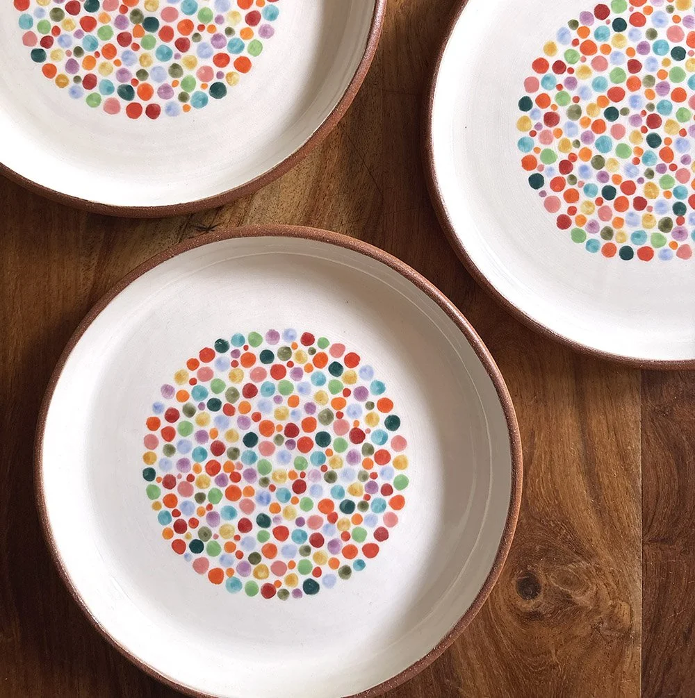 Dot plates in red clay
