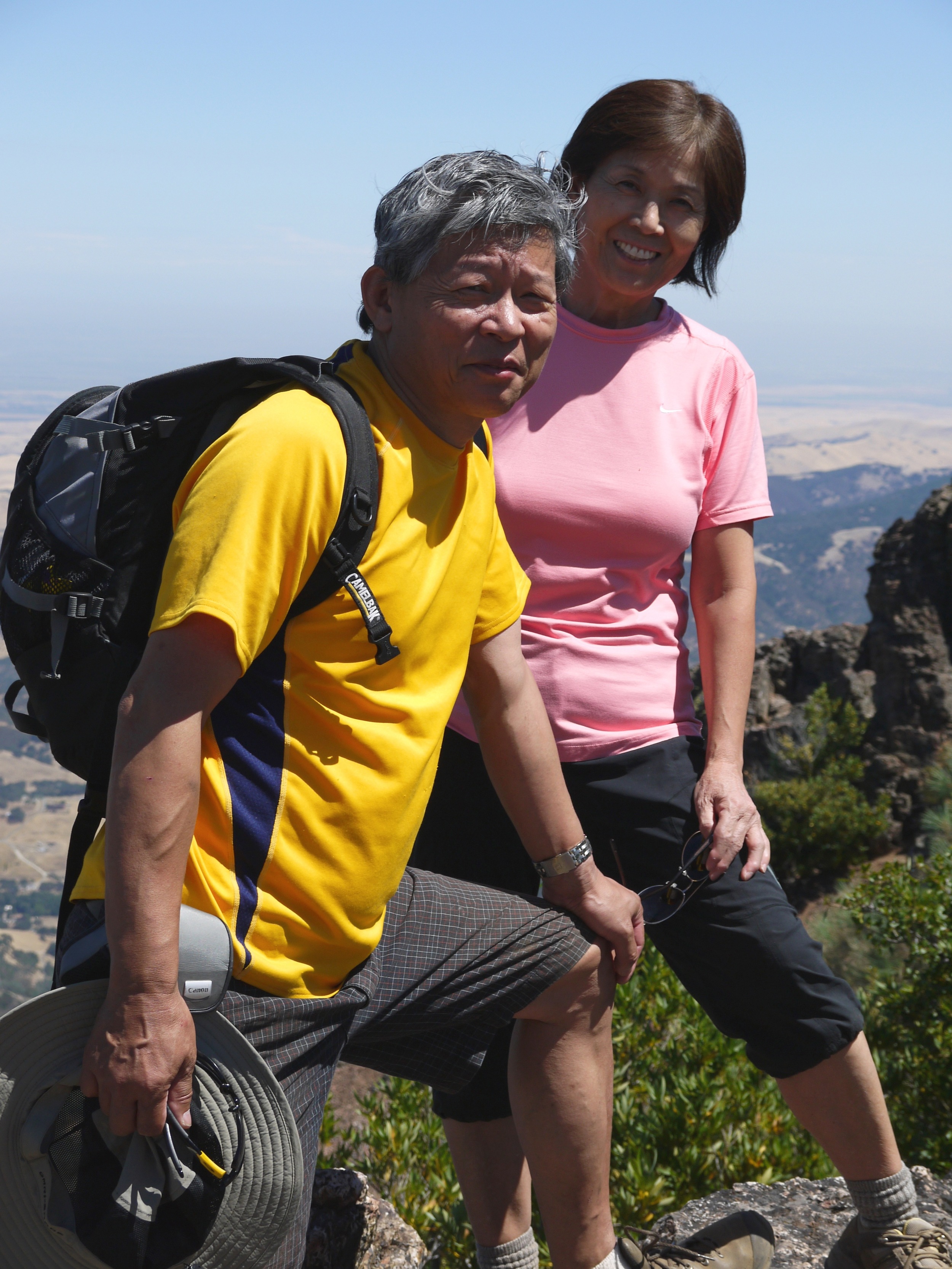 Masato and Yoko Suzuki grin and bear the trudge up North Peak Trail, Mt. Diablo.