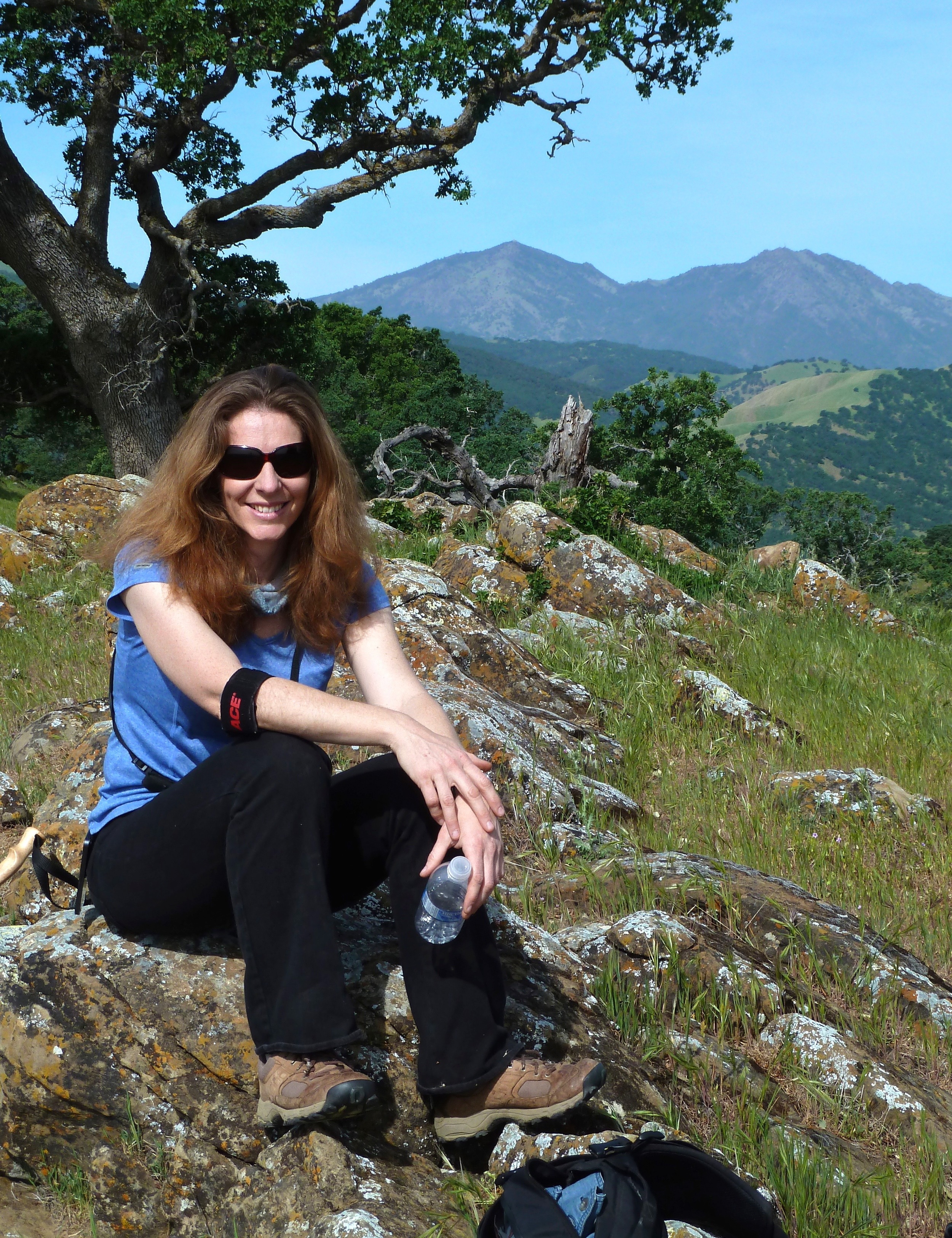 Eloine Chapman finds an ergonomically satisfying rock atop Round Valley.