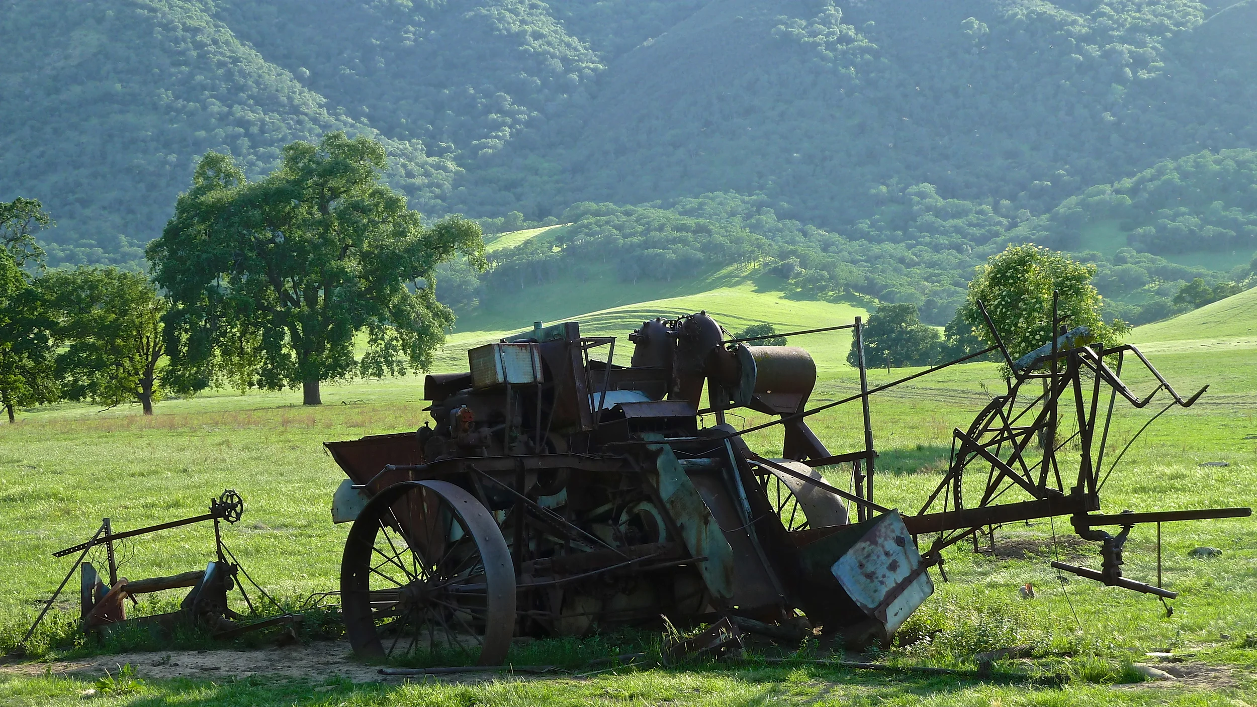 The rusted remains of a harvester combine belonging to rancher Jim Murphy, former owner of Round Valley, are among the many vintage farm implements scattered across Murphy Meadow.