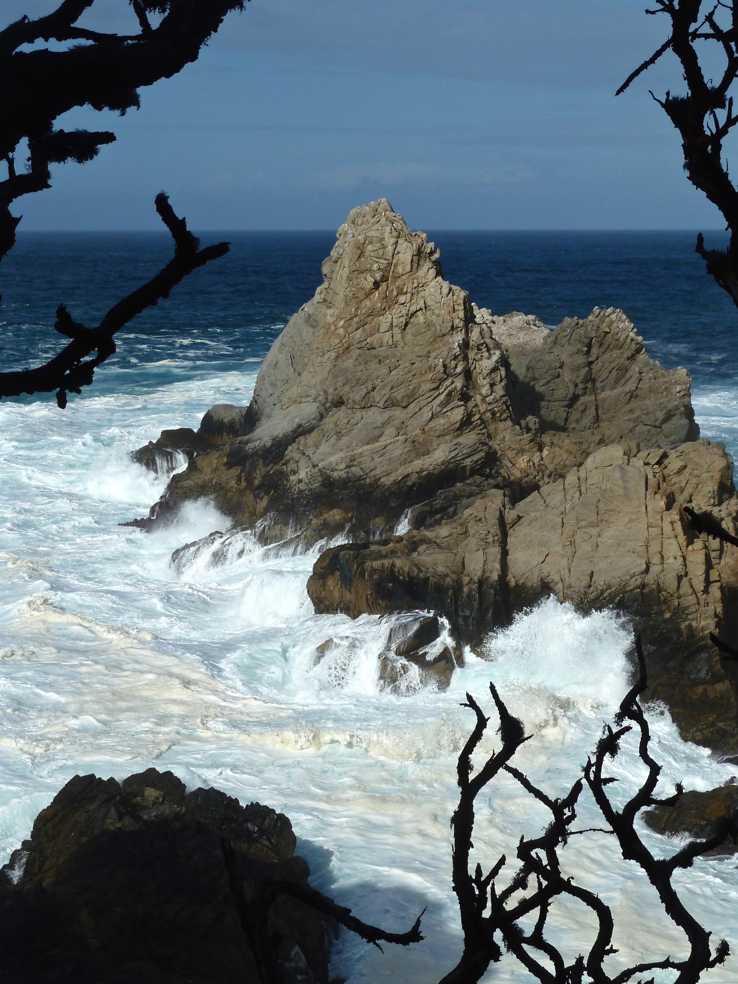 High tide and high winds churn the sea floor beneath the Pinnacle, viewed from Cypress Grove Trail.