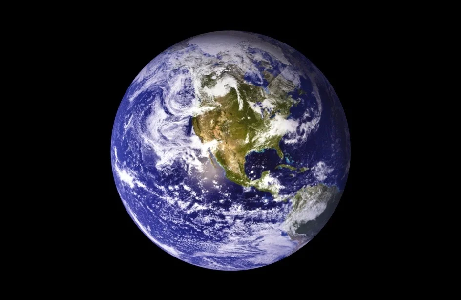 Oceans, clouds and continents adorn the orb of planet Earth as its citizens sail through the hostile ocean of outer space. Photo by NASA; rendering by Ger Erickson.
