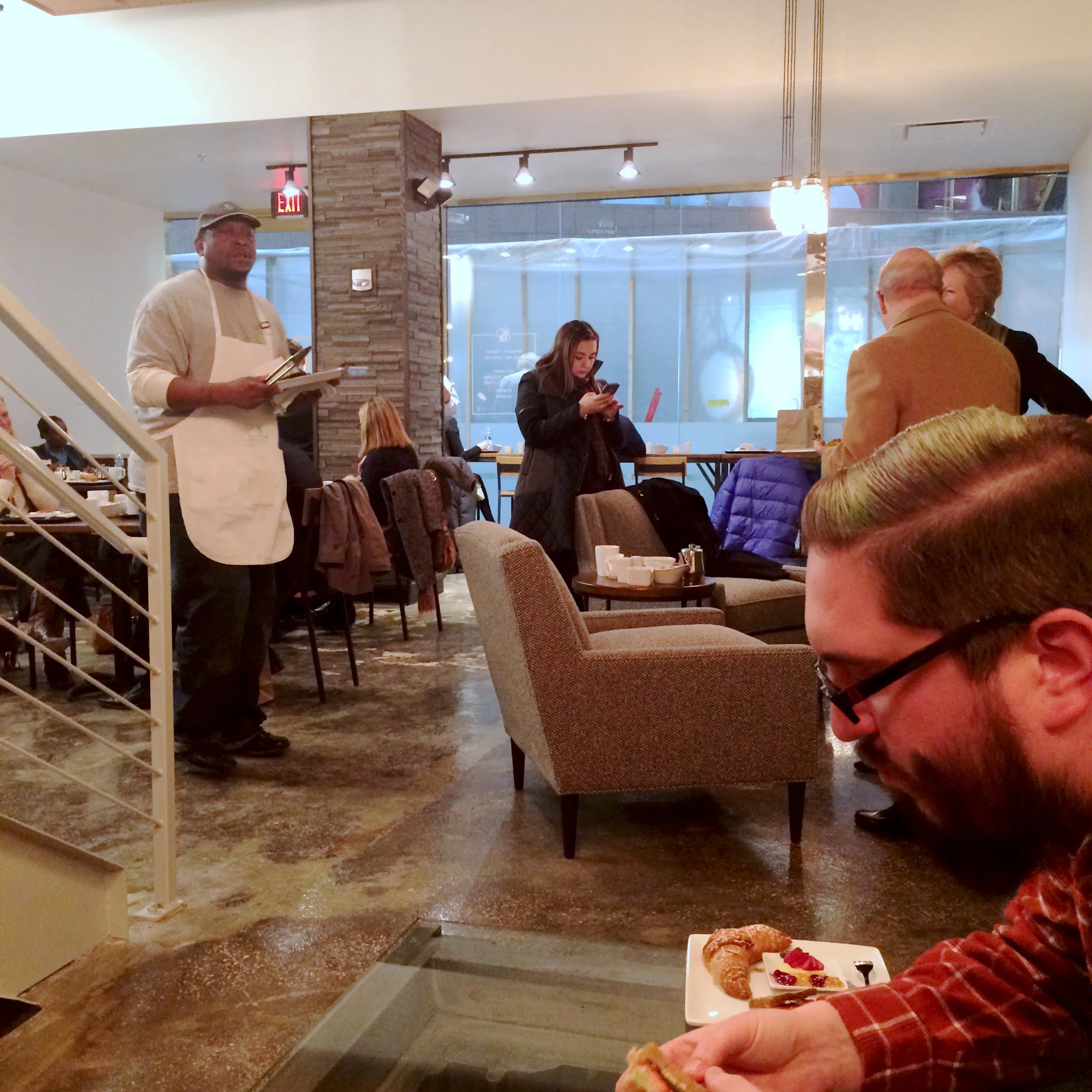 The man in the white apron proudly passes out the chocolate cookies he made himself, which my husband swiftly ate up and raved about.