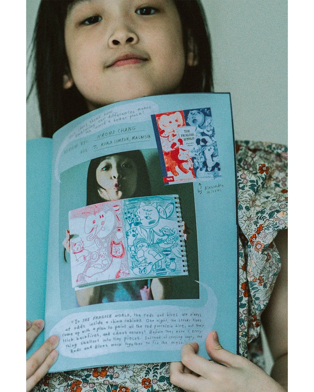For our Issue #26: Blue, we asked young writers to submit book reviews about BLUE books. We were WOWed by artwork and writing by seven-year-old Naomi Chang from Malasia, who reviewed about "The Fragile World" by Alexandra M&icirc;rzac. ⁠
⁠
